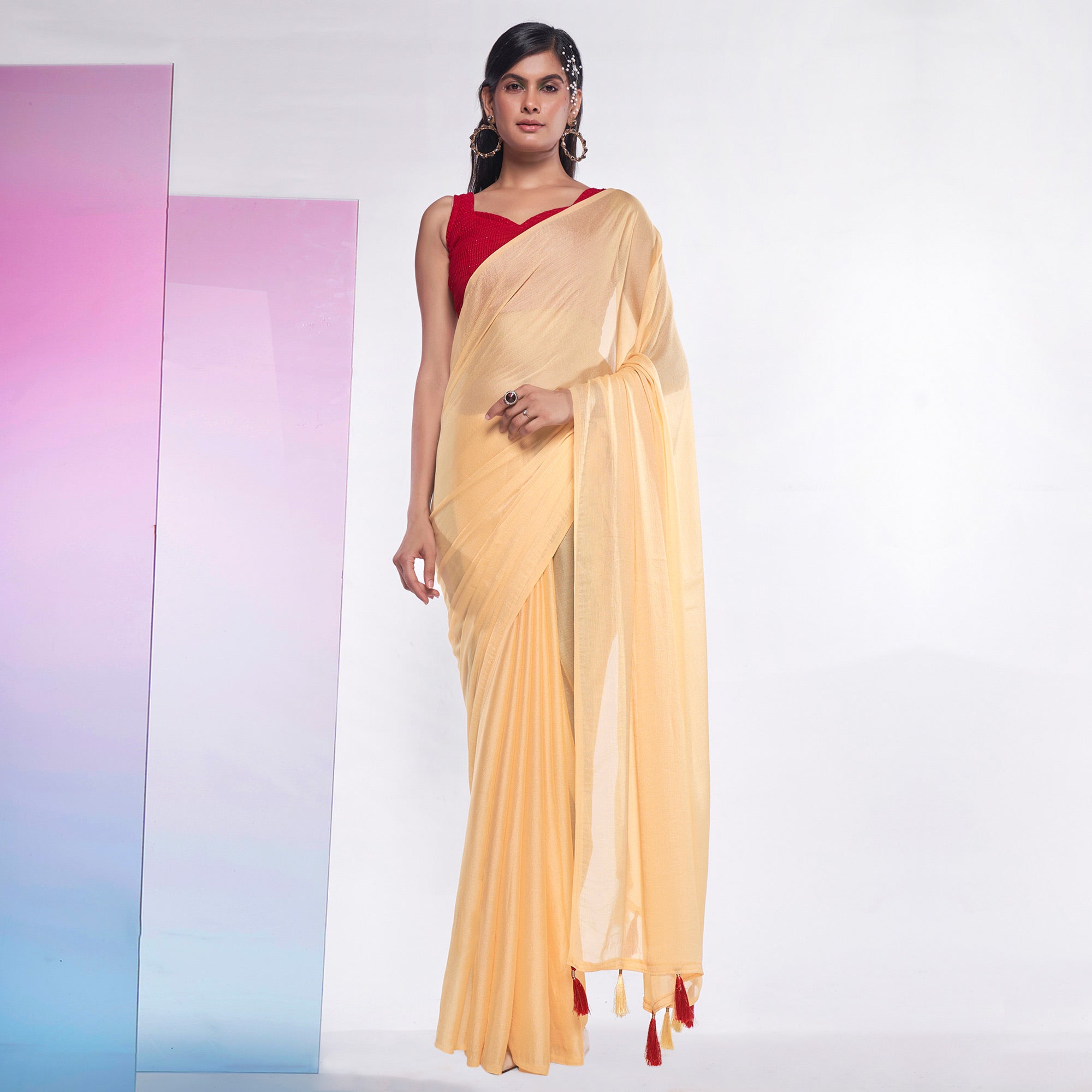 Yellow Solid Georgette Saree With Tassels