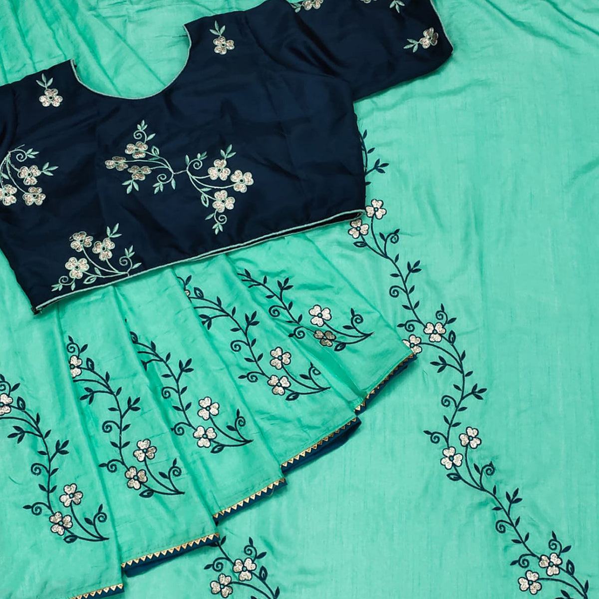 Turquoise Floral Embroidered Dola Silk Saree