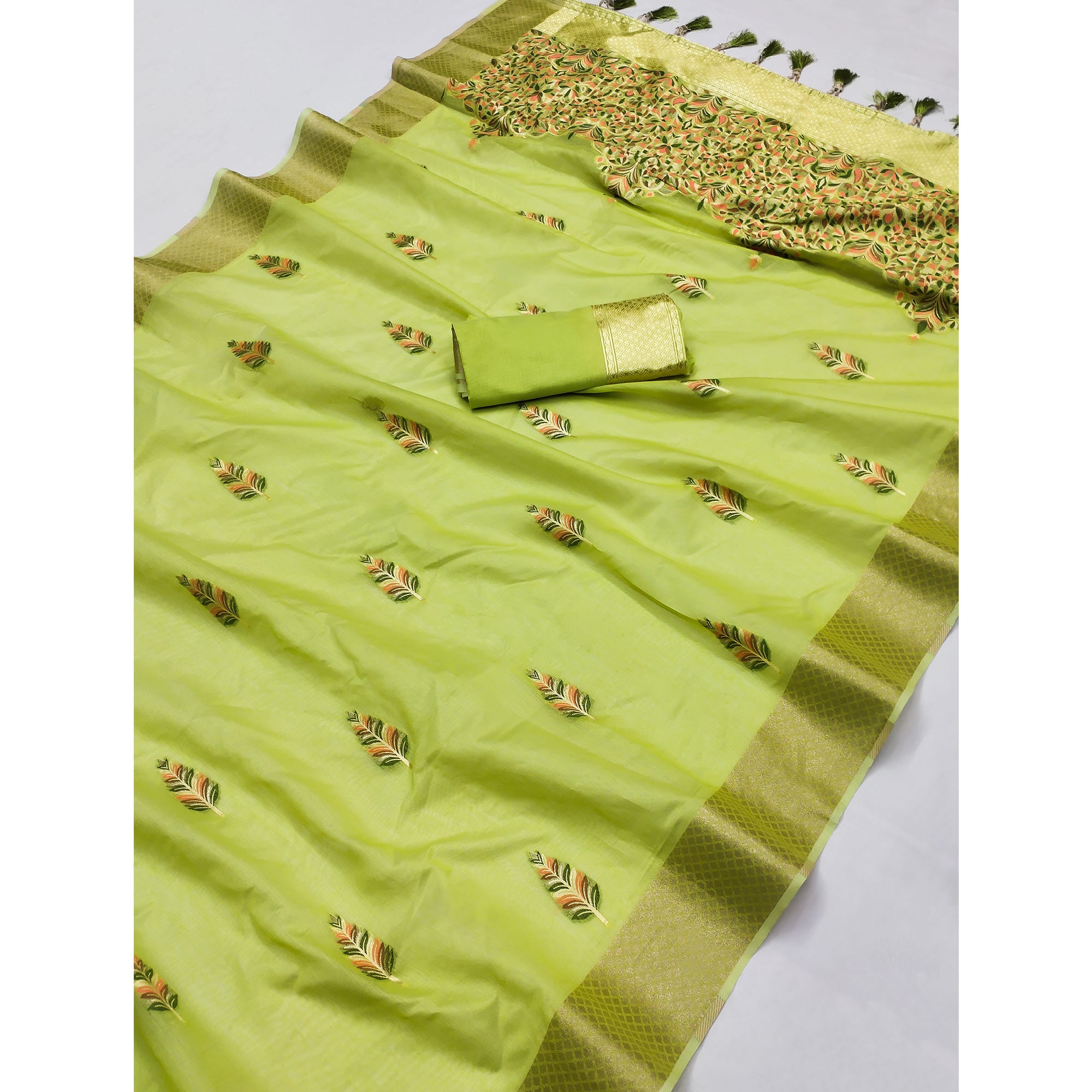 Green Woven Art Silk Saree With Tassels