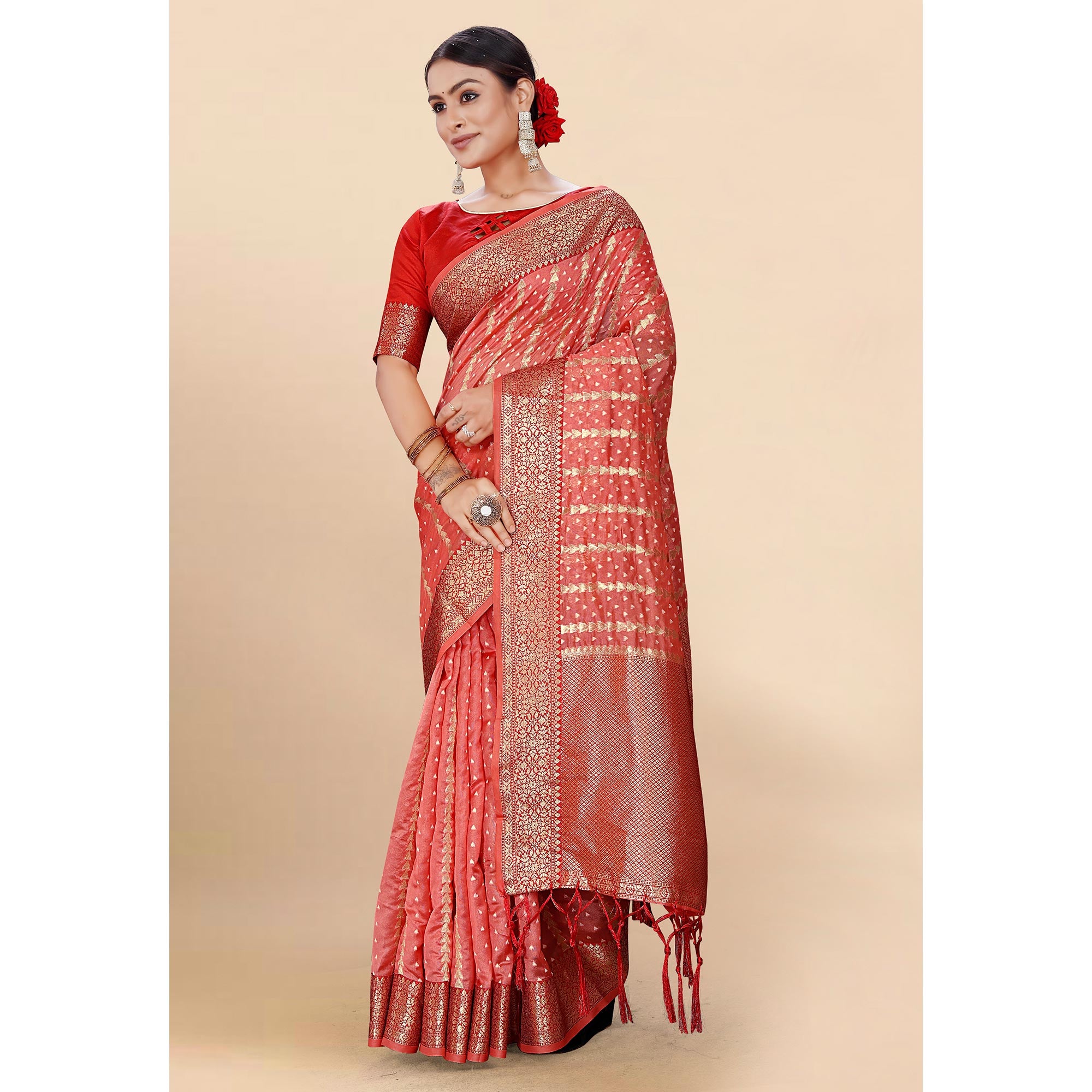 Pink Woven Organza Saree With Tassels