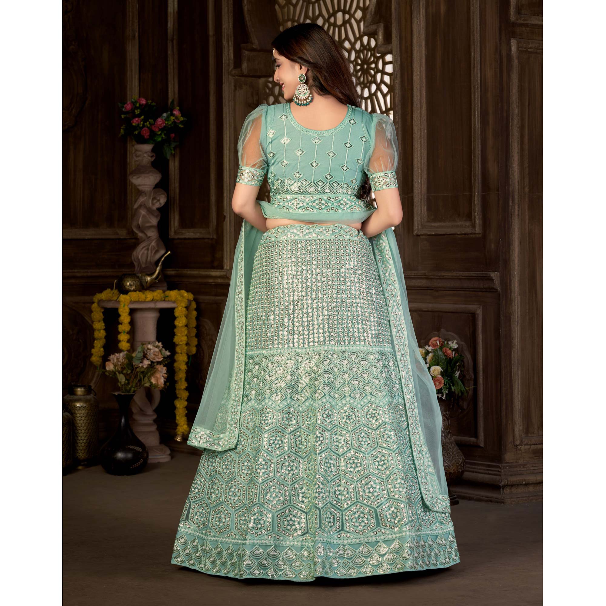 Sea Green Sequins Embroidered Netted Lehenga Choli