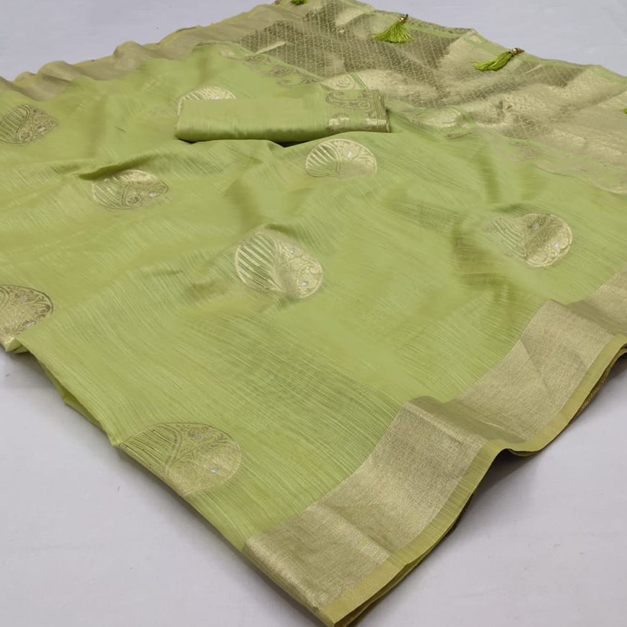 Green Woven Art Silk Saree With Tassels