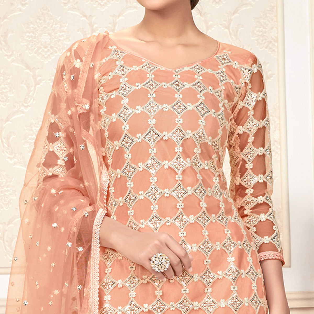 Peach Sequins Embroidered Net Semi Stitched Suit