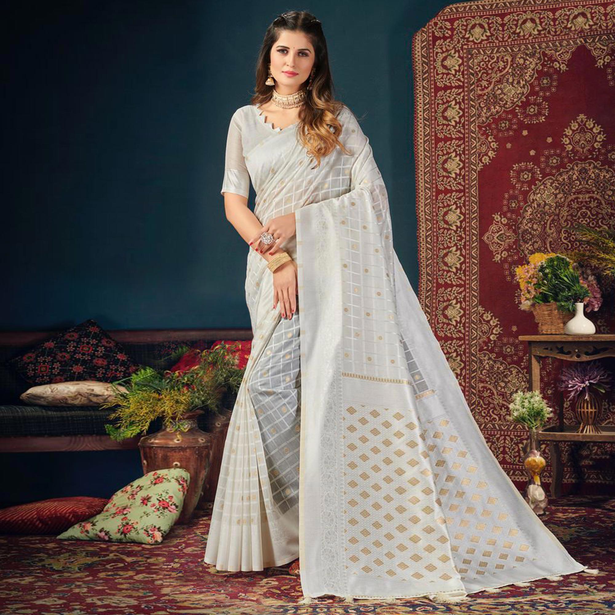 White Woven Cotton Blend Saree With Tassels