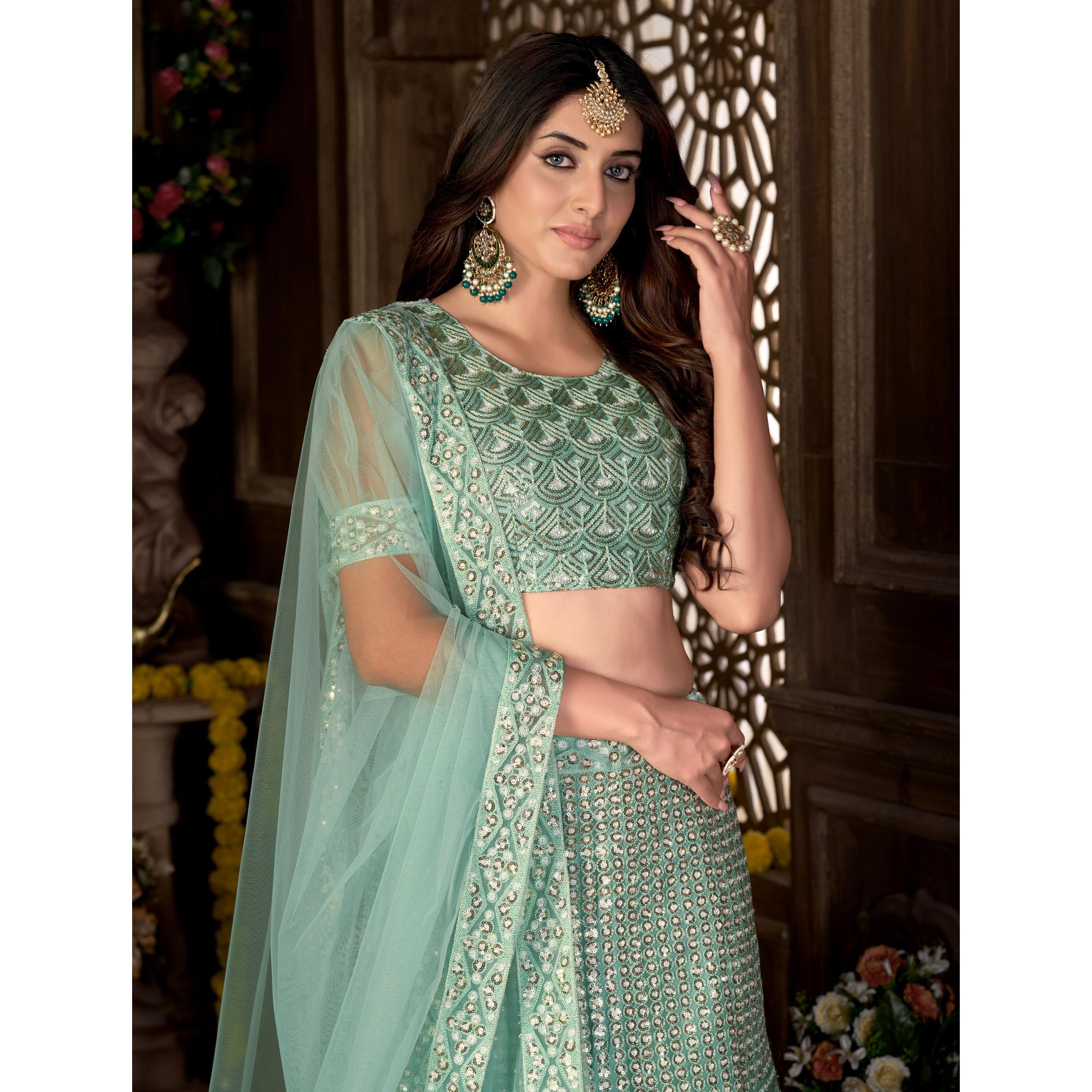 Sea Green Sequins Embroidered Netted Lehenga Choli