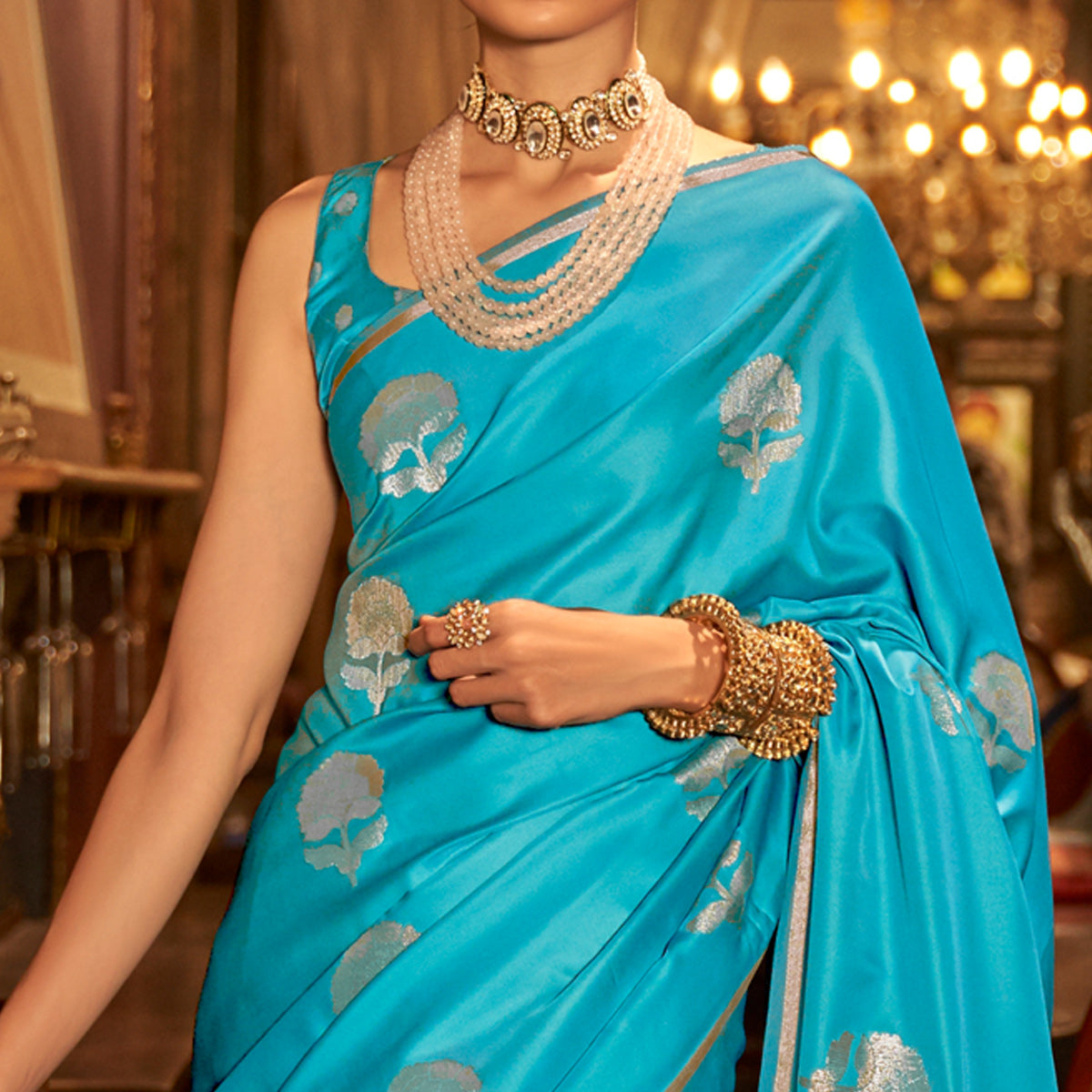 Blue Floral Woven Satin Saree With Tassels