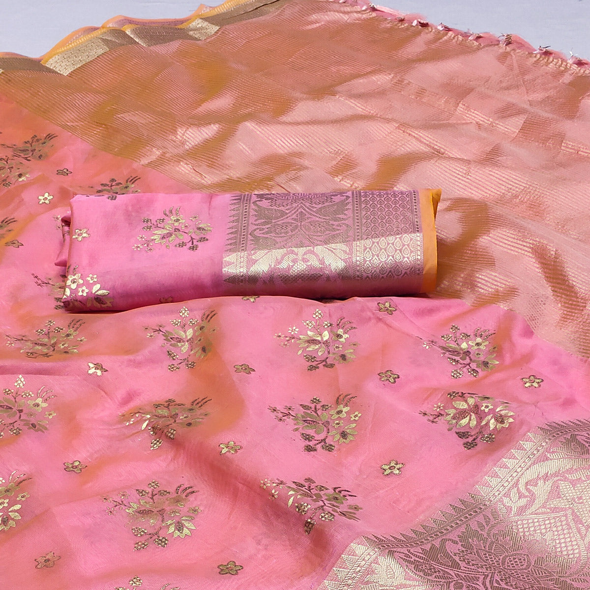 Pink Woven Organza Saree With Tassels