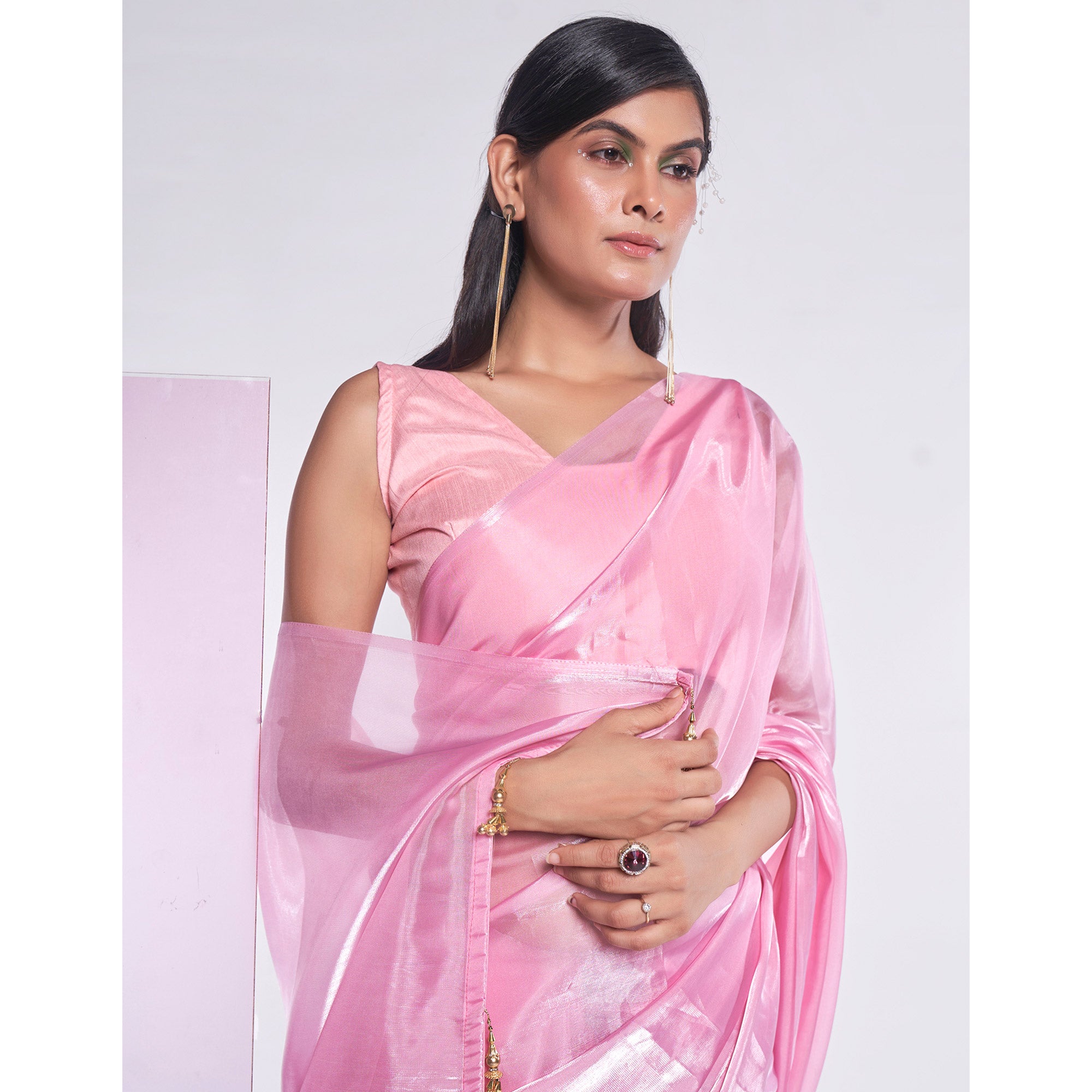 Pink Solid Organza Saree With Tassels