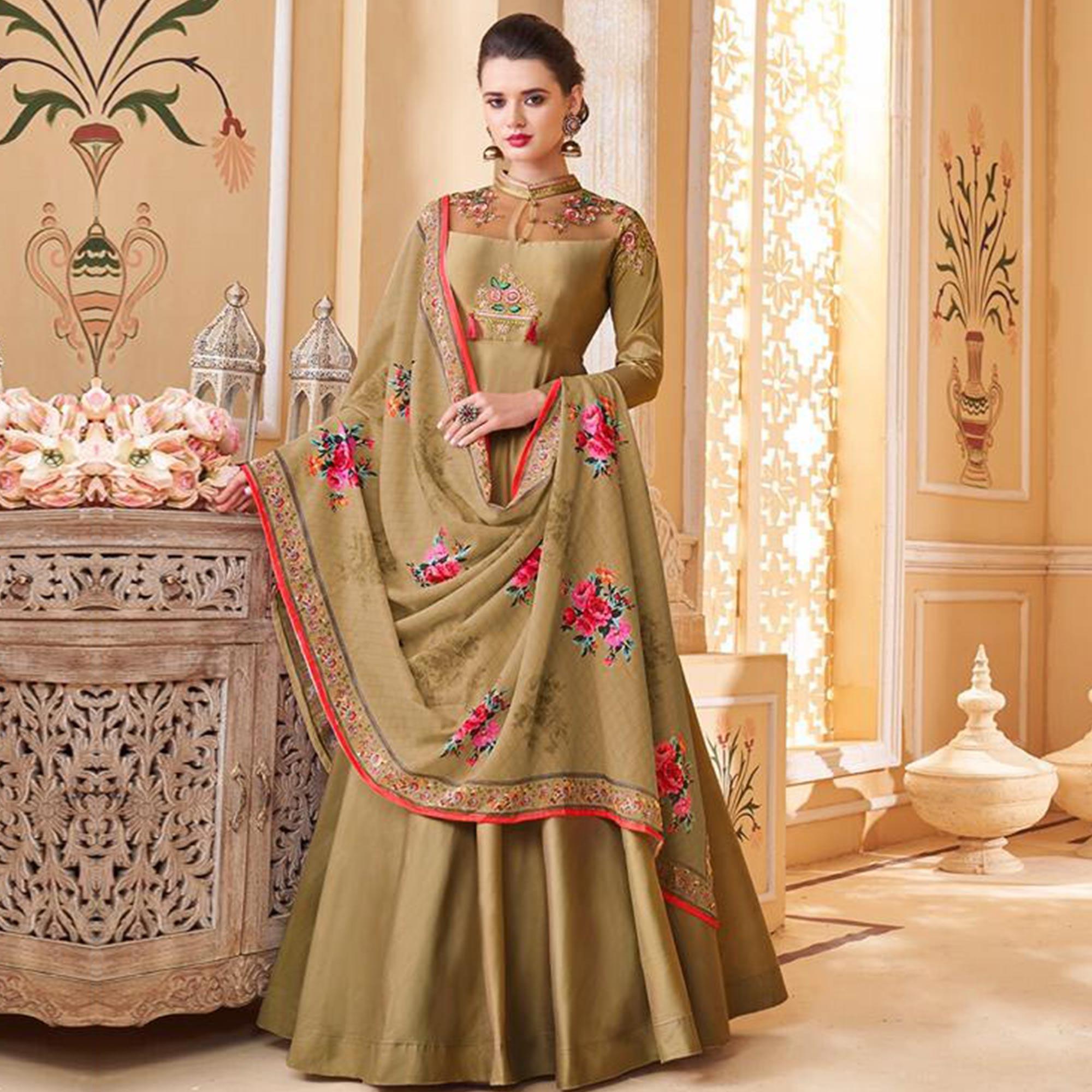 Flamboyant Chiku Colored Partywear Embroidered Silk Anarkali Suit - Peachmode