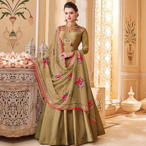 Flamboyant Chiku Colored Partywear Embroidered Silk Anarkali Suit - Peachmode