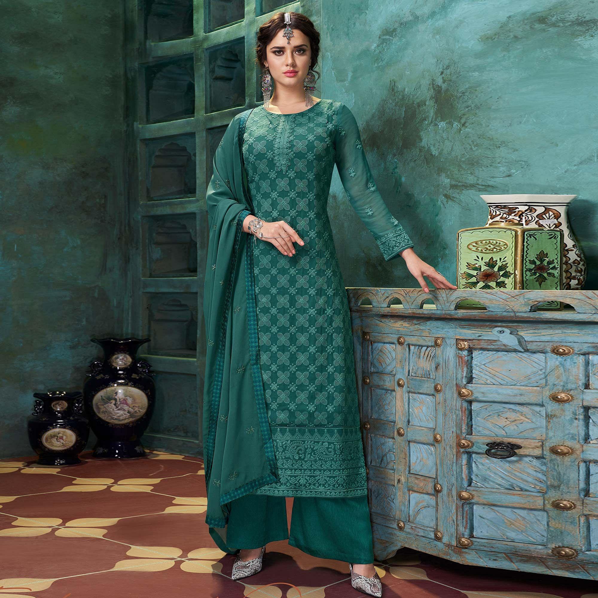 Flamboyant Dark Green Colored Partywear Embroidered Heavy Faux Georgette Palazzo Suit - Peachmode