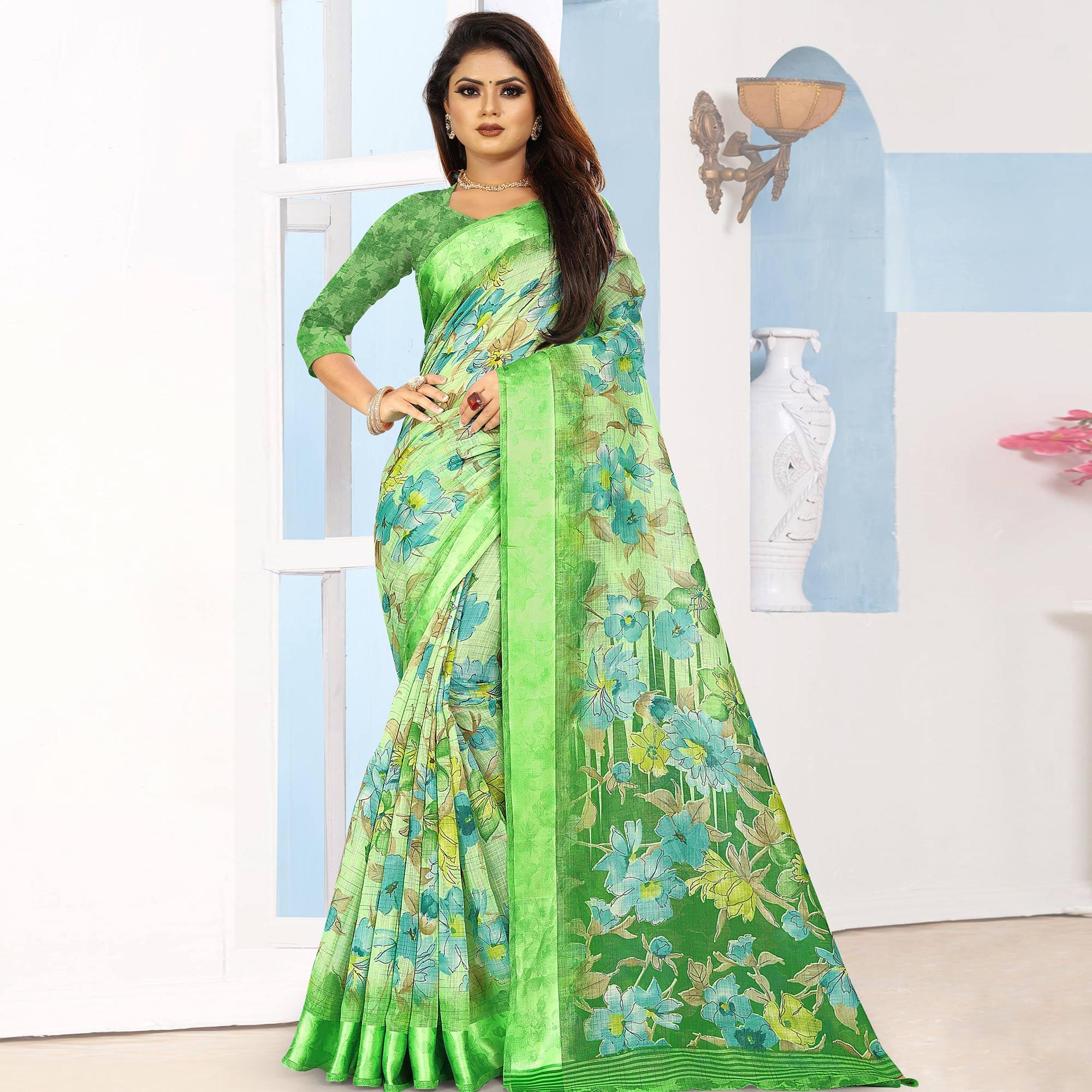 Flamboyant Green Colored Casual Wear Floral Printed Linen Saree With Satin Patta Border - Peachmode