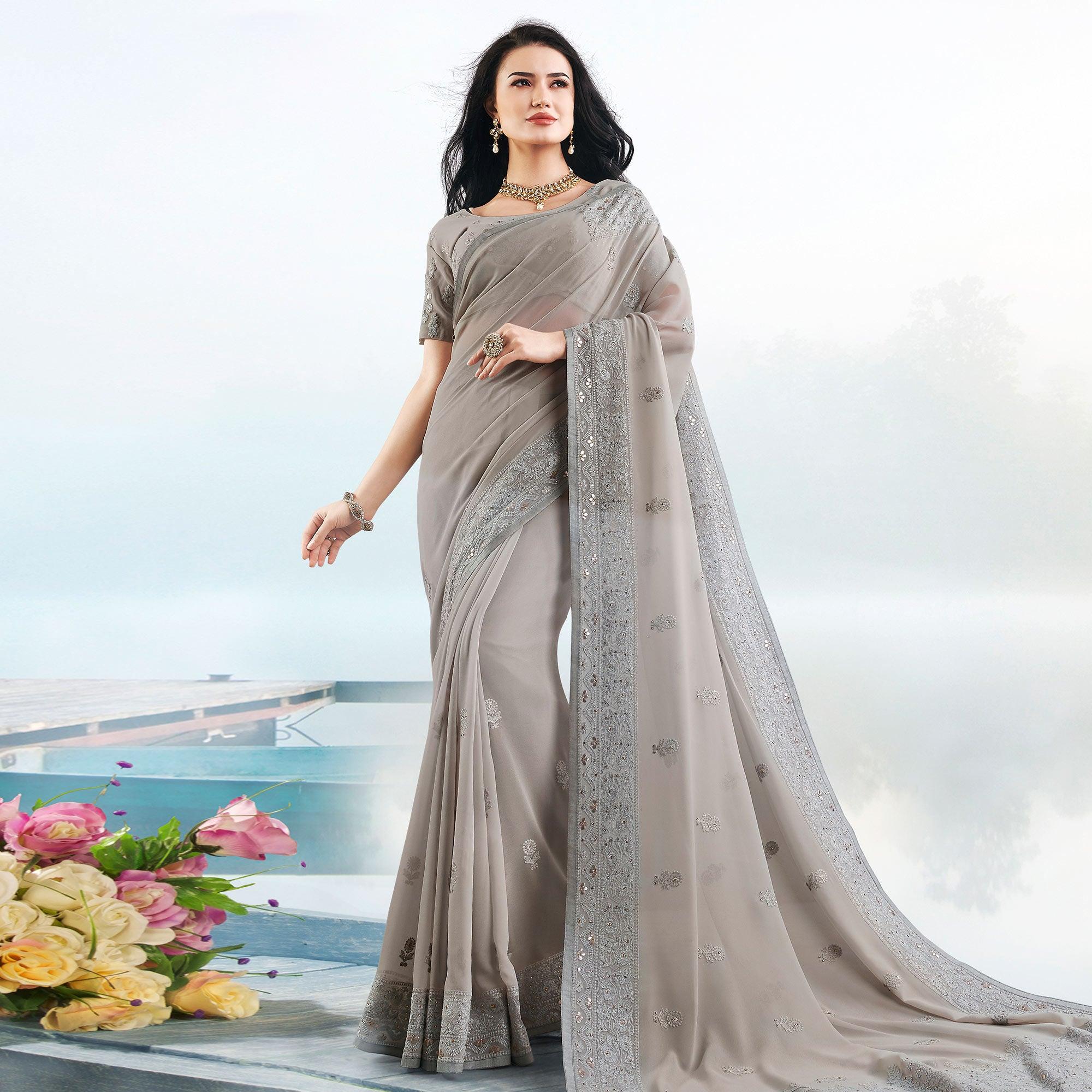 Flattering Grey Colored Partywear Embroidered Georgette Saree - Peachmode