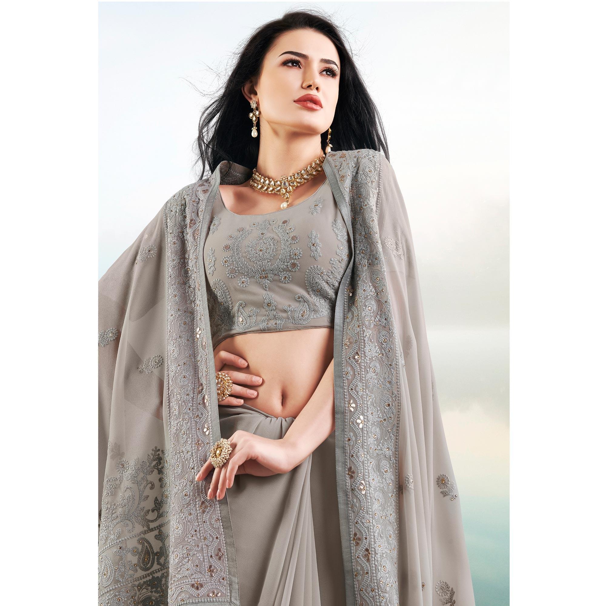 Flattering Grey Colored Partywear Embroidered Georgette Saree - Peachmode