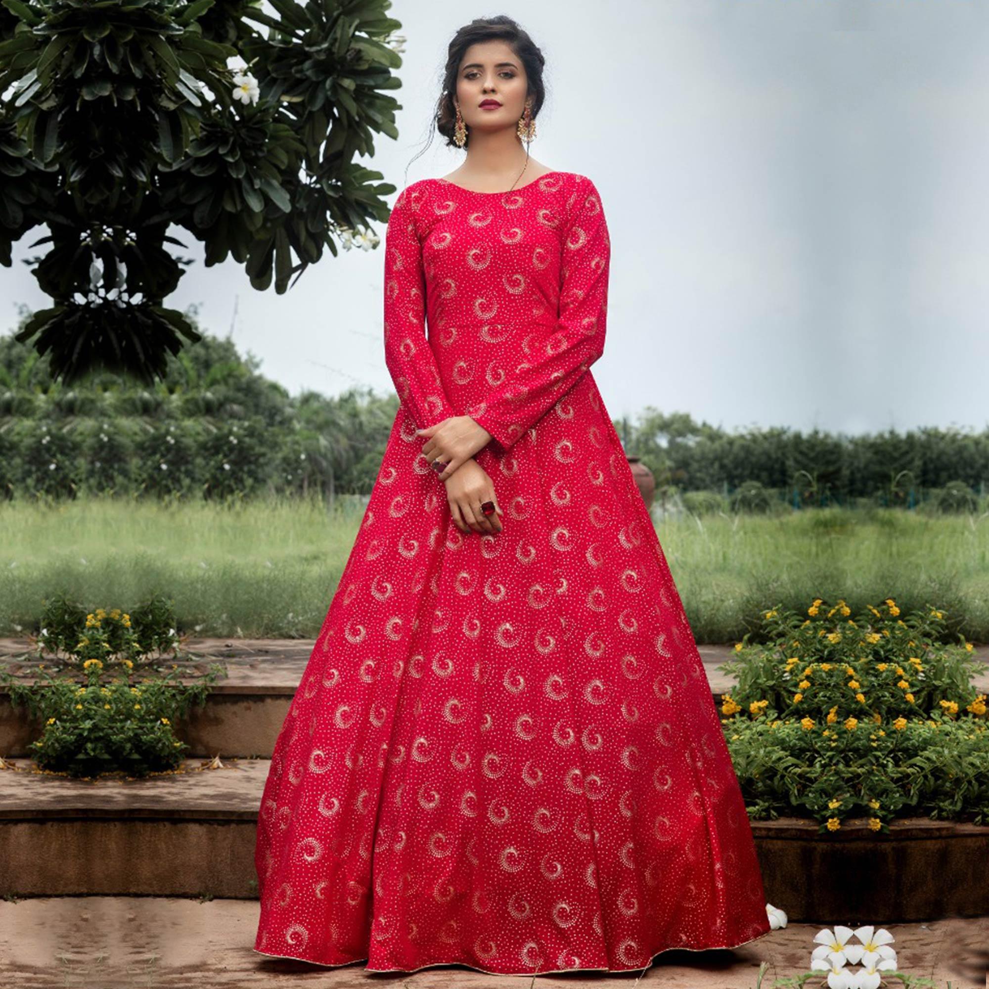 Flattering Pink Colored Party Wear Foil Printed Georgette Gown - Peachmode