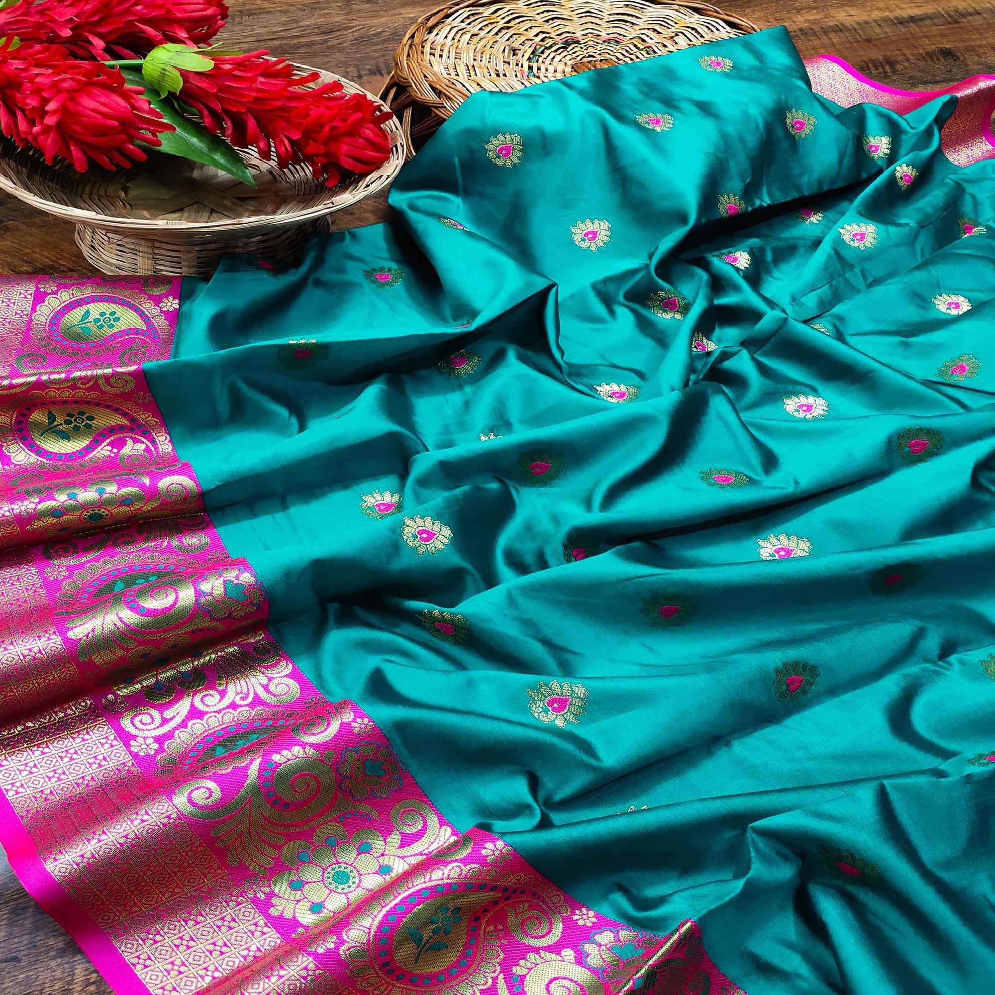 Flattering Turquoise Blue Colored Festive Wear Woven Kanjivaram Silk Saree - Peachmode