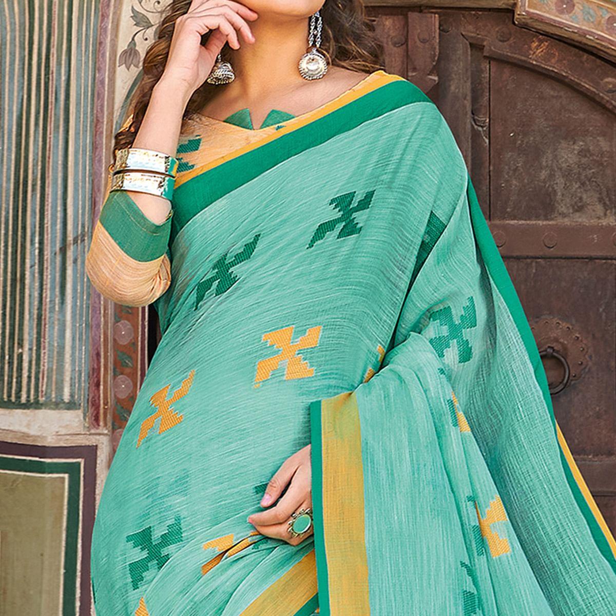 Flattering Turquoise Green Colored Casual Printed Linen Cotton Saree With Tassels - Peachmode