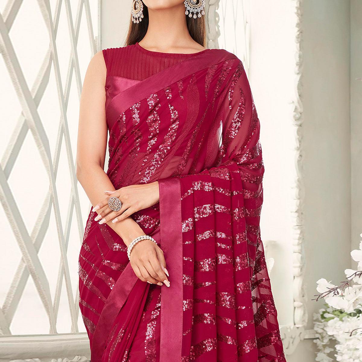 Fuchsia Pink Sequence Embroidered Georgette Saree With Tassels - Peachmode
