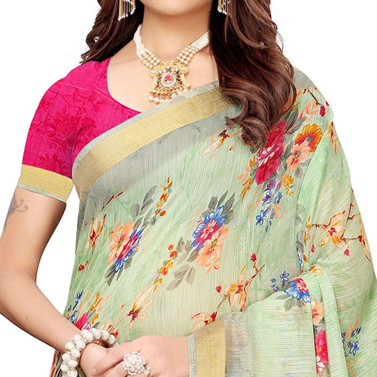 Gleaming Pastel Green Colored Casual Printed Linen Saree - Peachmode