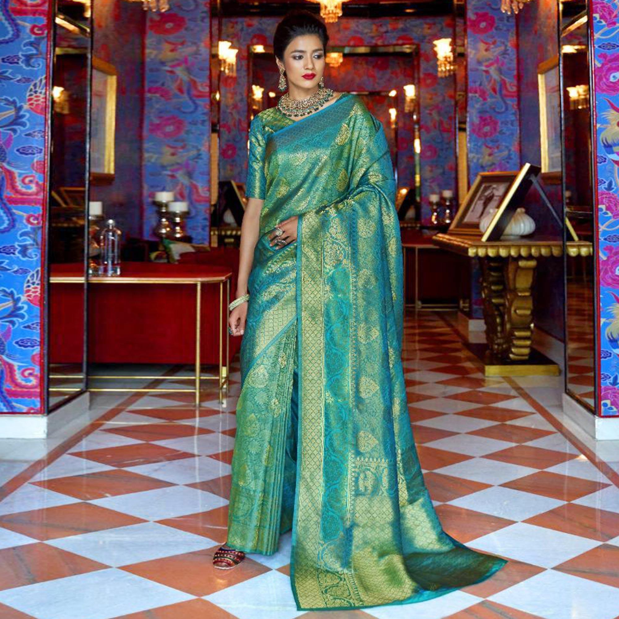 Gleaming Turquoise Blue Colored Festive Wear Woven Art Silk Saree - Peachmode