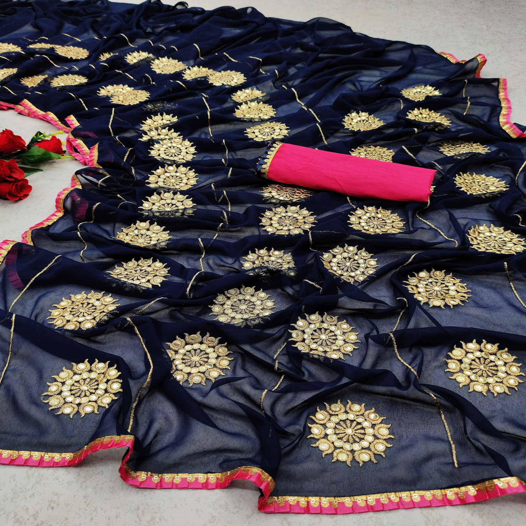 Glorious Dark Blue Colored Partywear Embroidered Georgette Saree - Peachmode