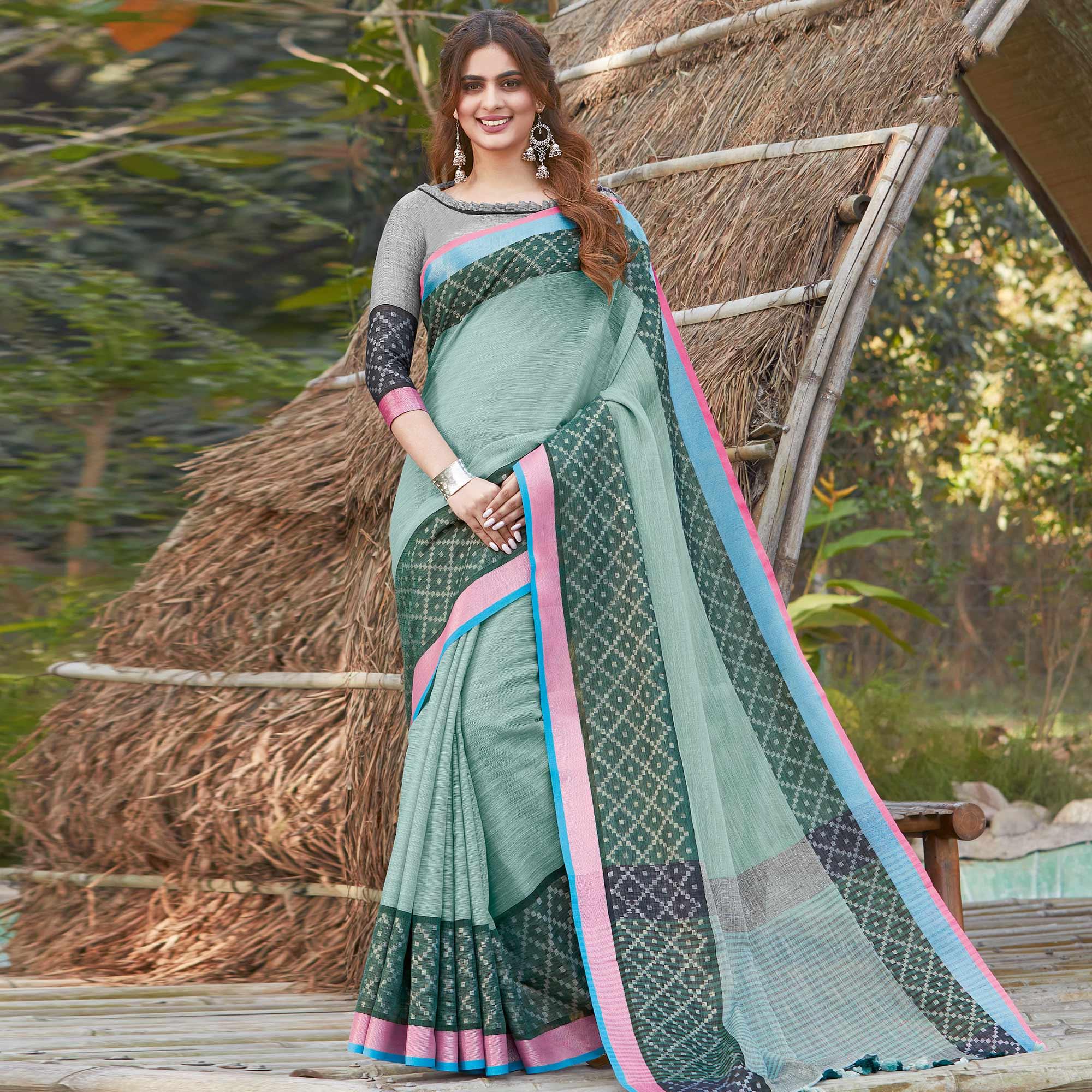 Glorious Green Colored Festive Wear Woven Linen Saree - Peachmode