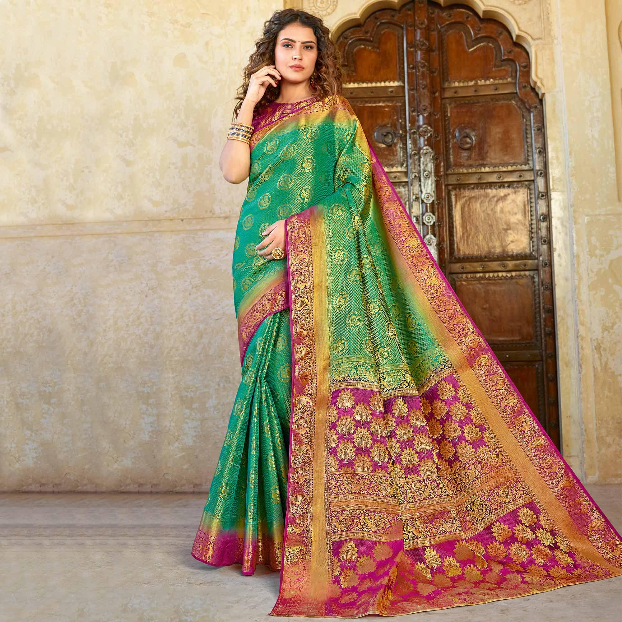 Glorious Green Colored Festive Wear Woven Silk Saree - Peachmode