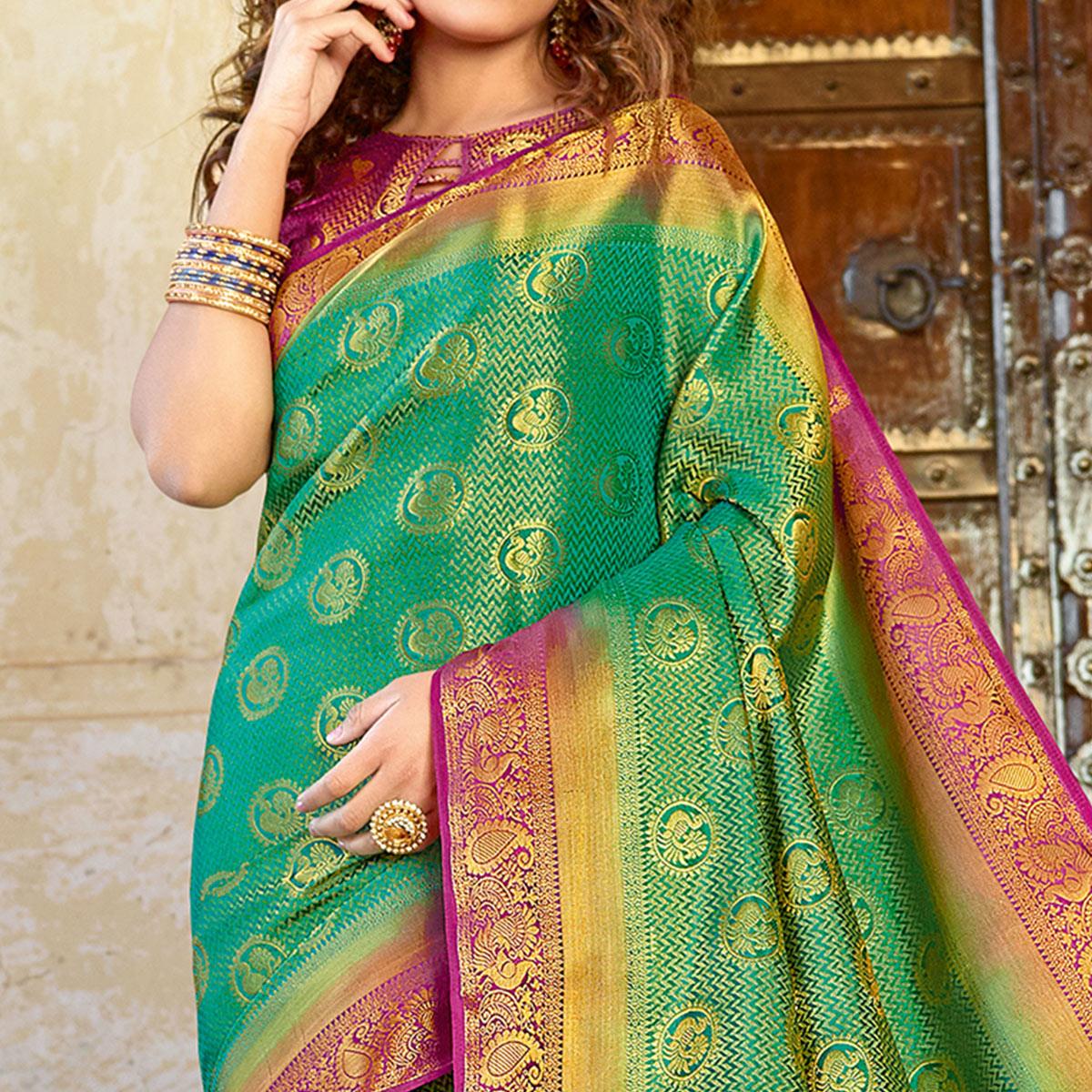 Glorious Green Colored Festive Wear Woven Silk Saree - Peachmode