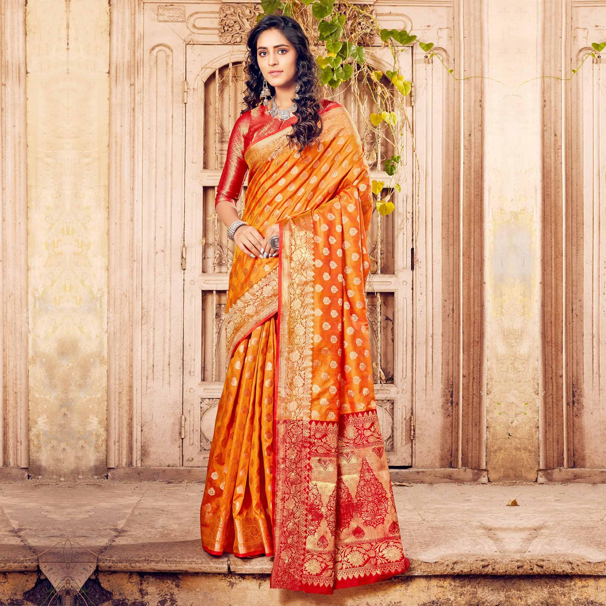 Glorious Orange Coloured Designer Partywear Weaving Silk Saree - Peachmode