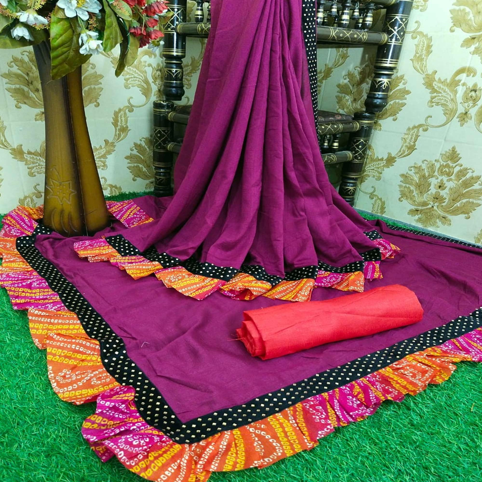 Glorious Wine Colored Partywear Solid Vichitra Silk Saree With Bandhani Print Ruffle - Peachmode