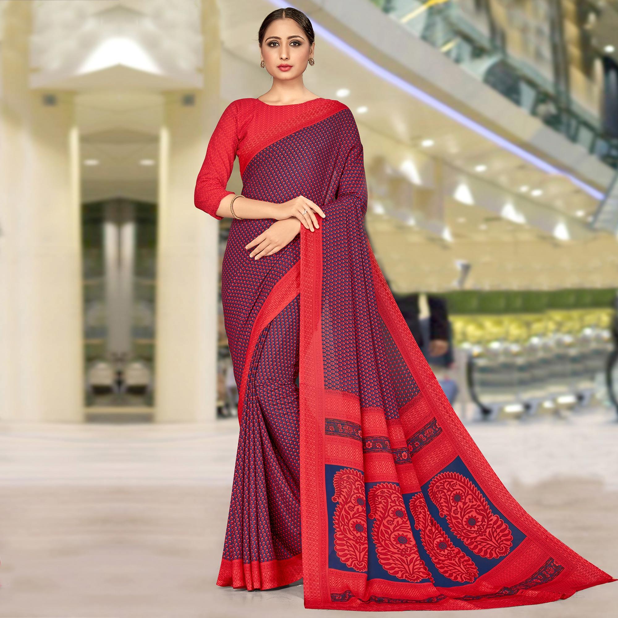 Glowing Blue & Red Coloured Casual Wear Printed Crepe Saree - Peachmode