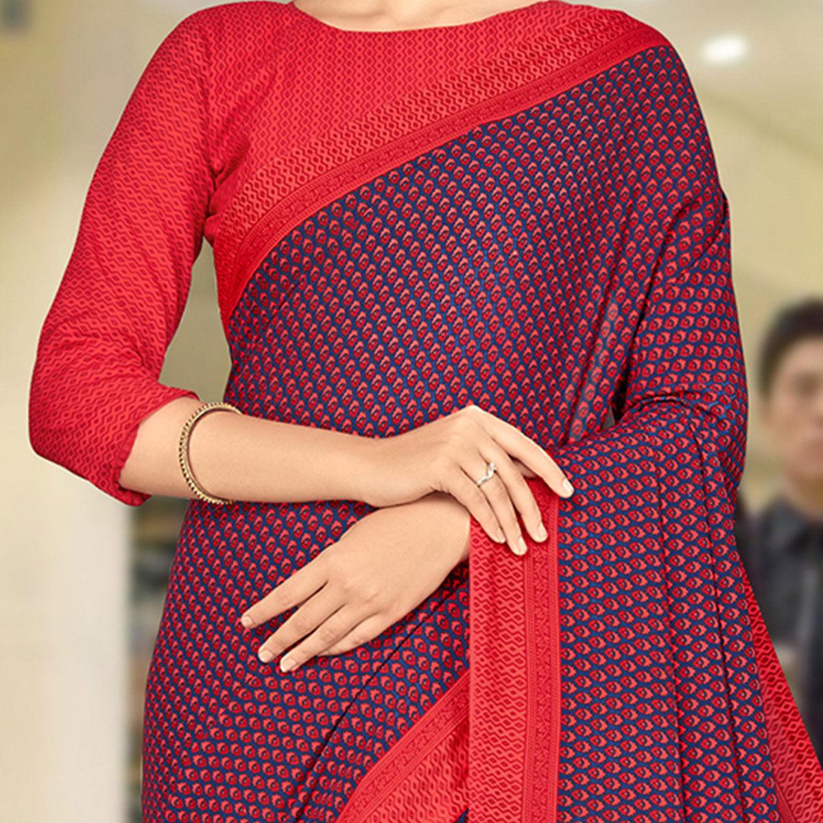 Glowing Blue & Red Coloured Casual Wear Printed Crepe Saree - Peachmode