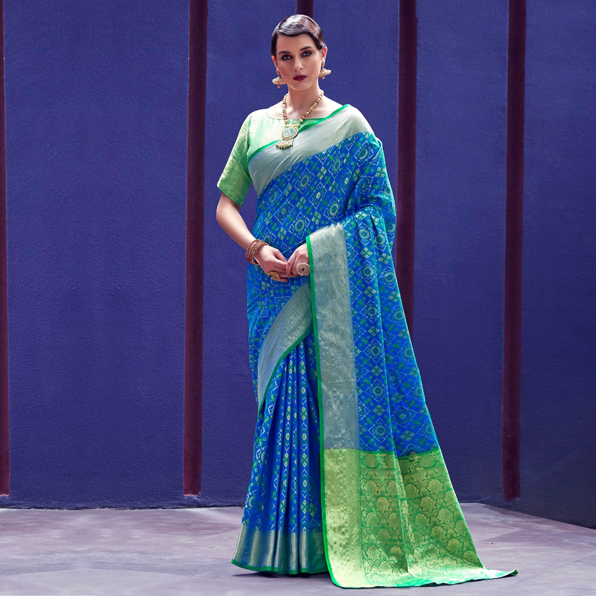 Glowing Blue Colored Festive Wear Woven Indian Patola Silk Saree - Peachmode