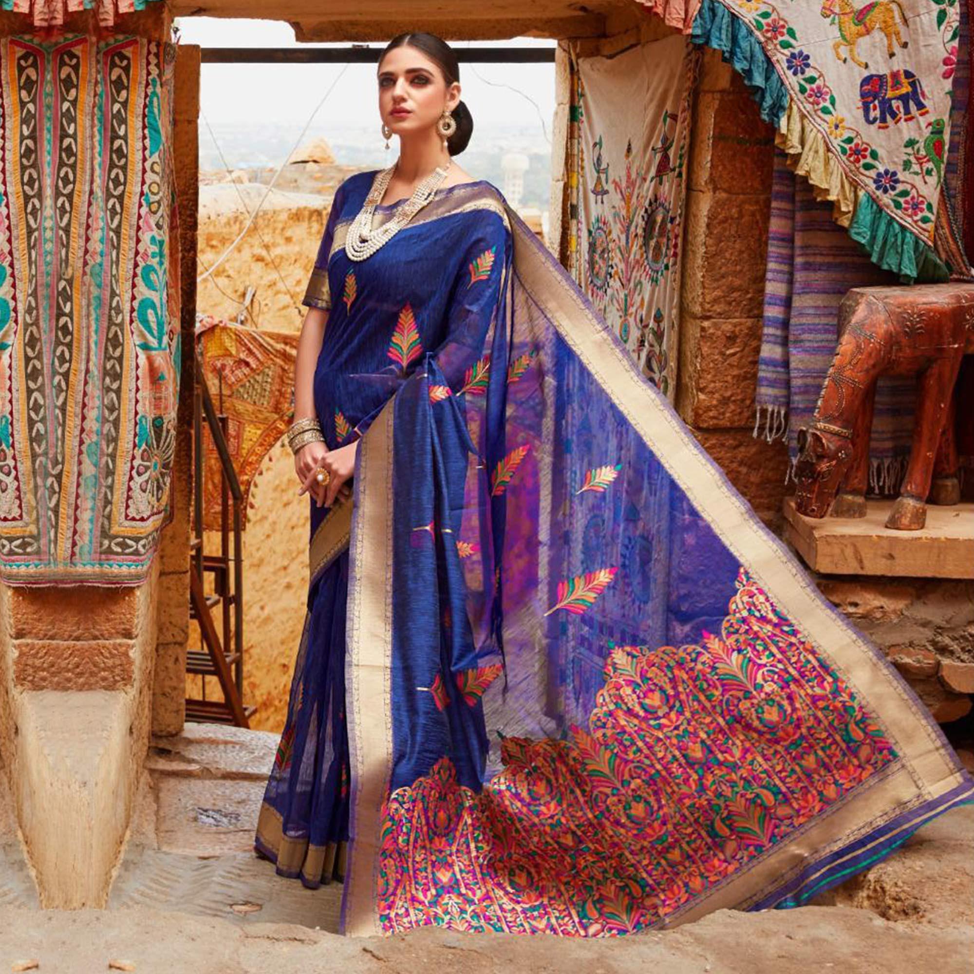 Glowing Blue Colored Partywear Printed Linen Saree - Peachmode