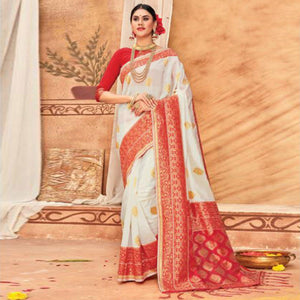 Glowing Cream & Red Colored Festive Wear Woven Silk Blend Saree With Tassels - Peachmode