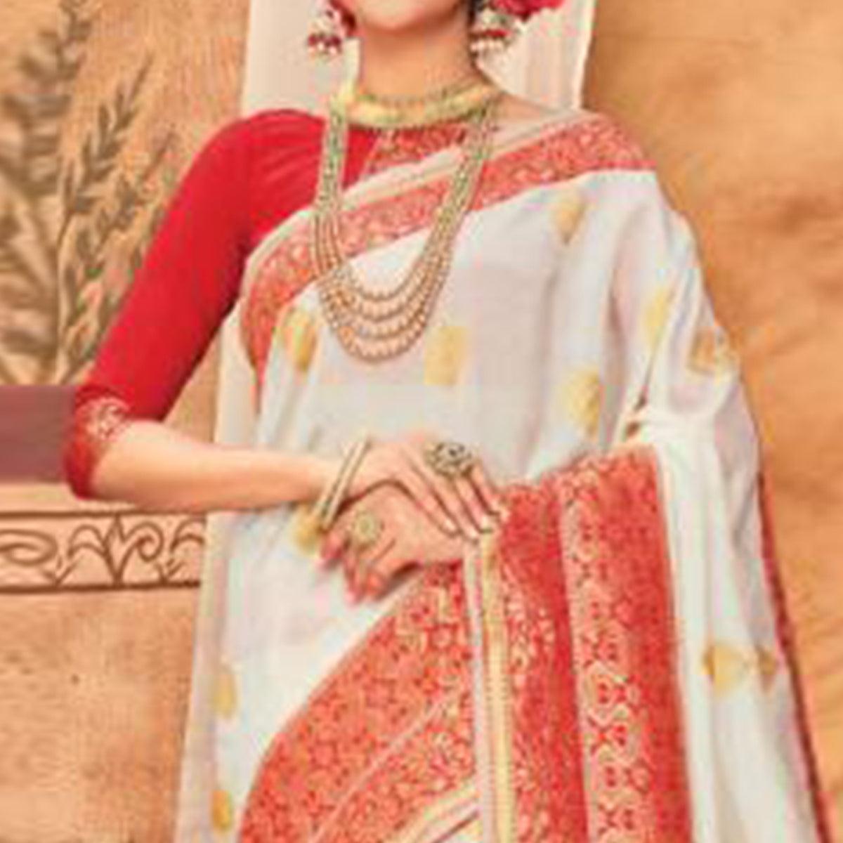 Glowing Cream & Red Colored Festive Wear Woven Silk Blend Saree With Tassels - Peachmode