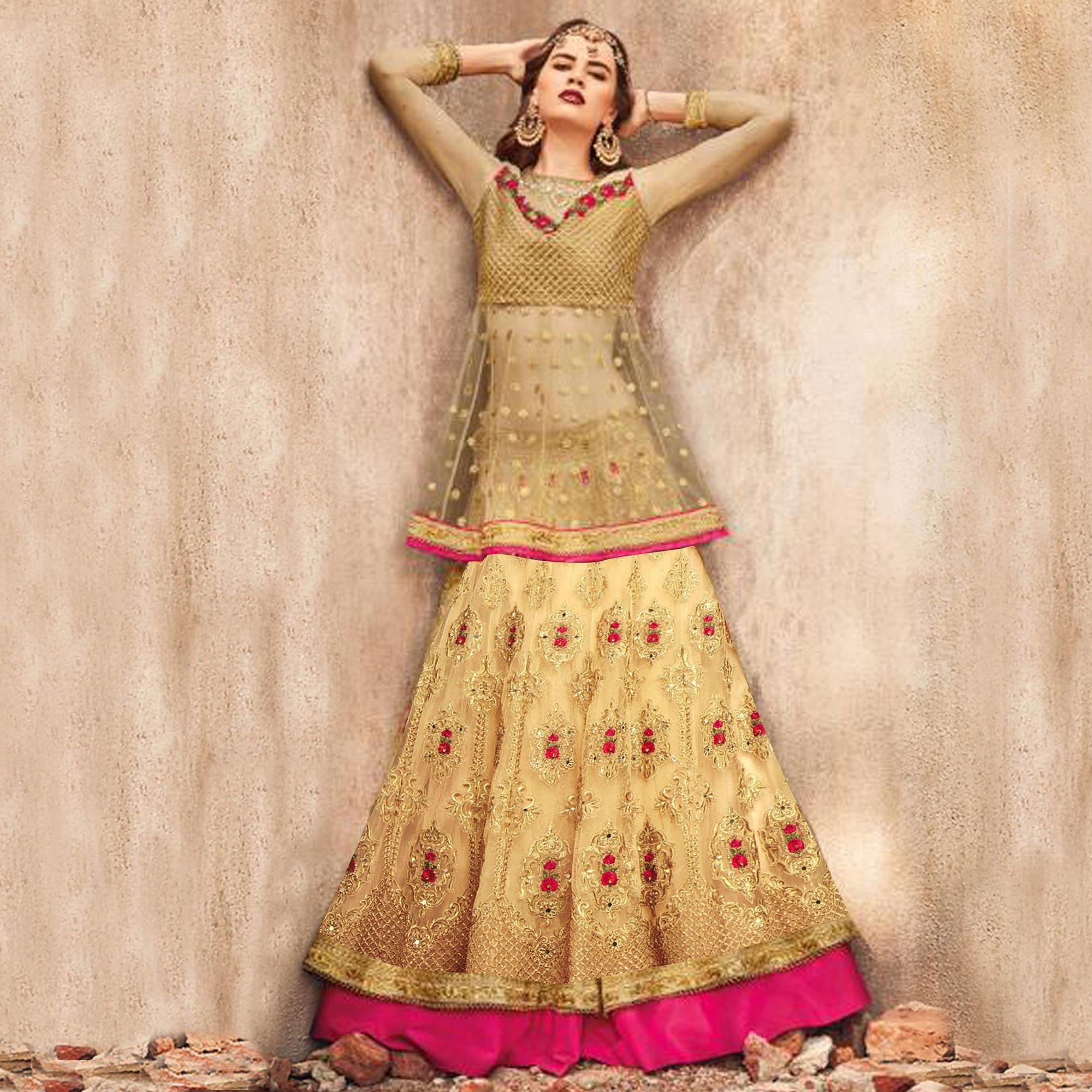 Glowing Golden-Pink Colored Party Wear Embroidered Net Lehenga Choli - Peachmode