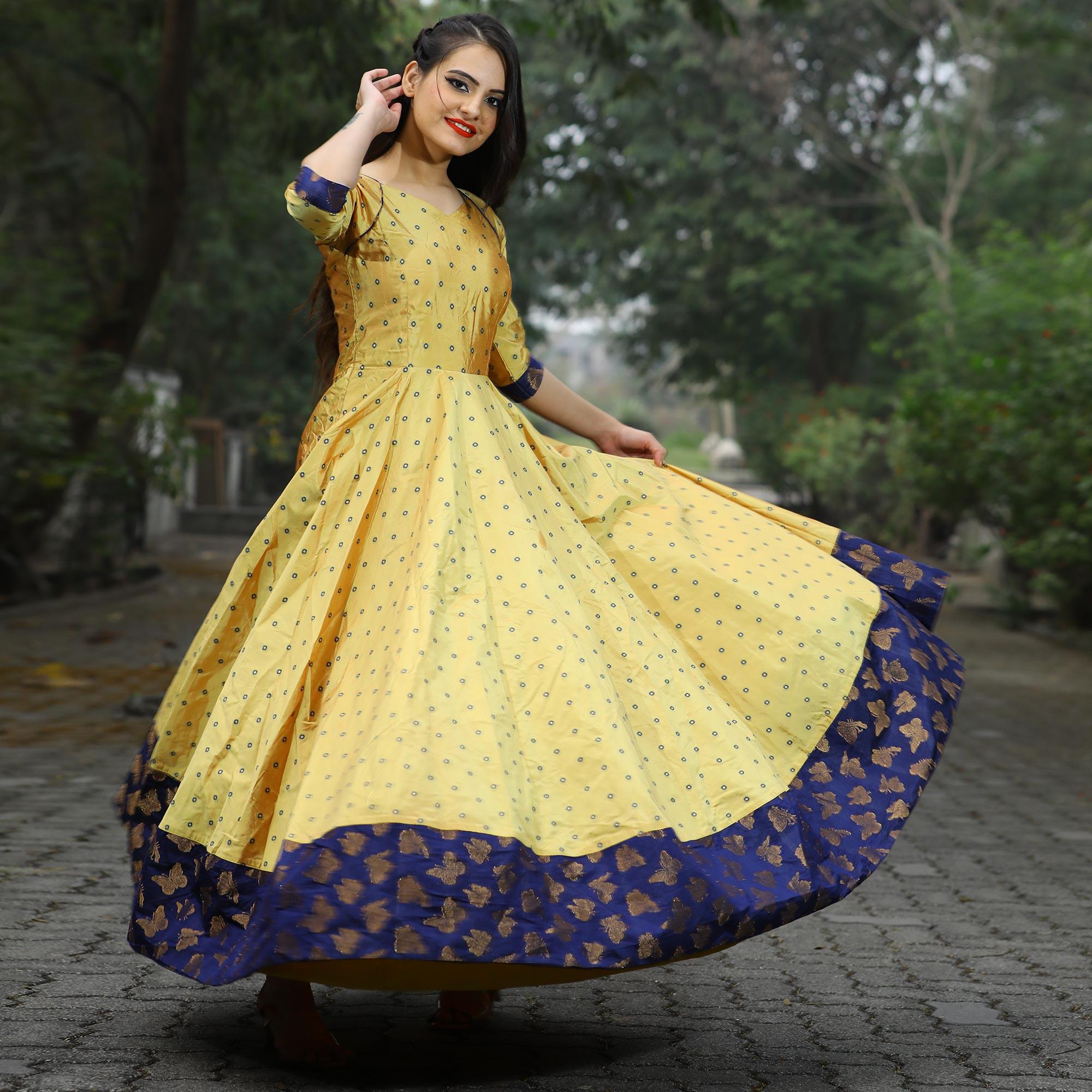 Glowing Light Yellow Colored Partywear Tapetta Gown - Peachmode