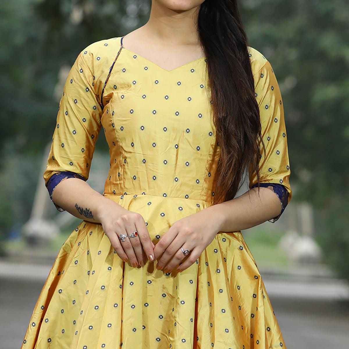 Glowing Light Yellow Colored Partywear Tapetta Gown - Peachmode