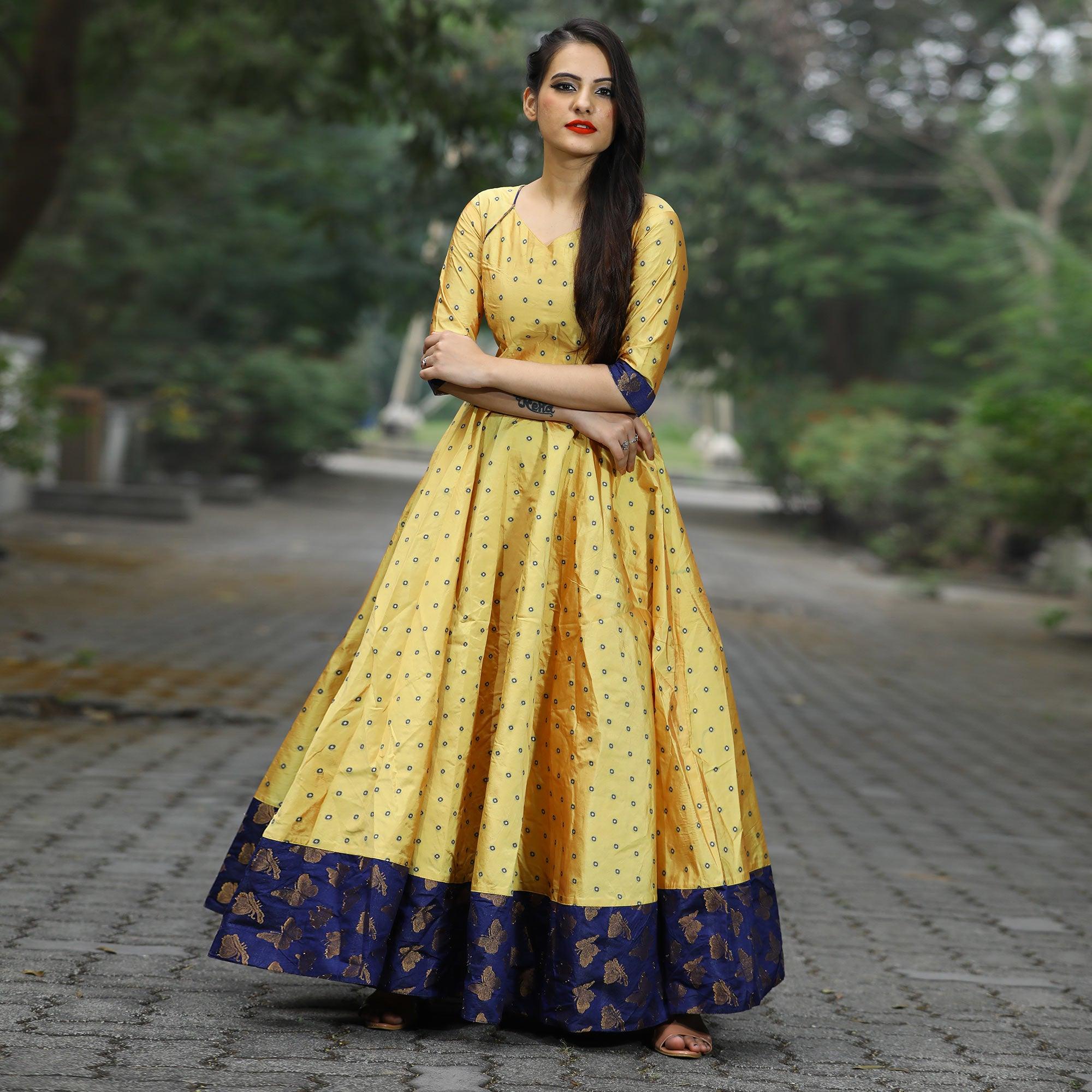 Glowing Light Yellow Colored Partywear Tapetta Gown - Peachmode