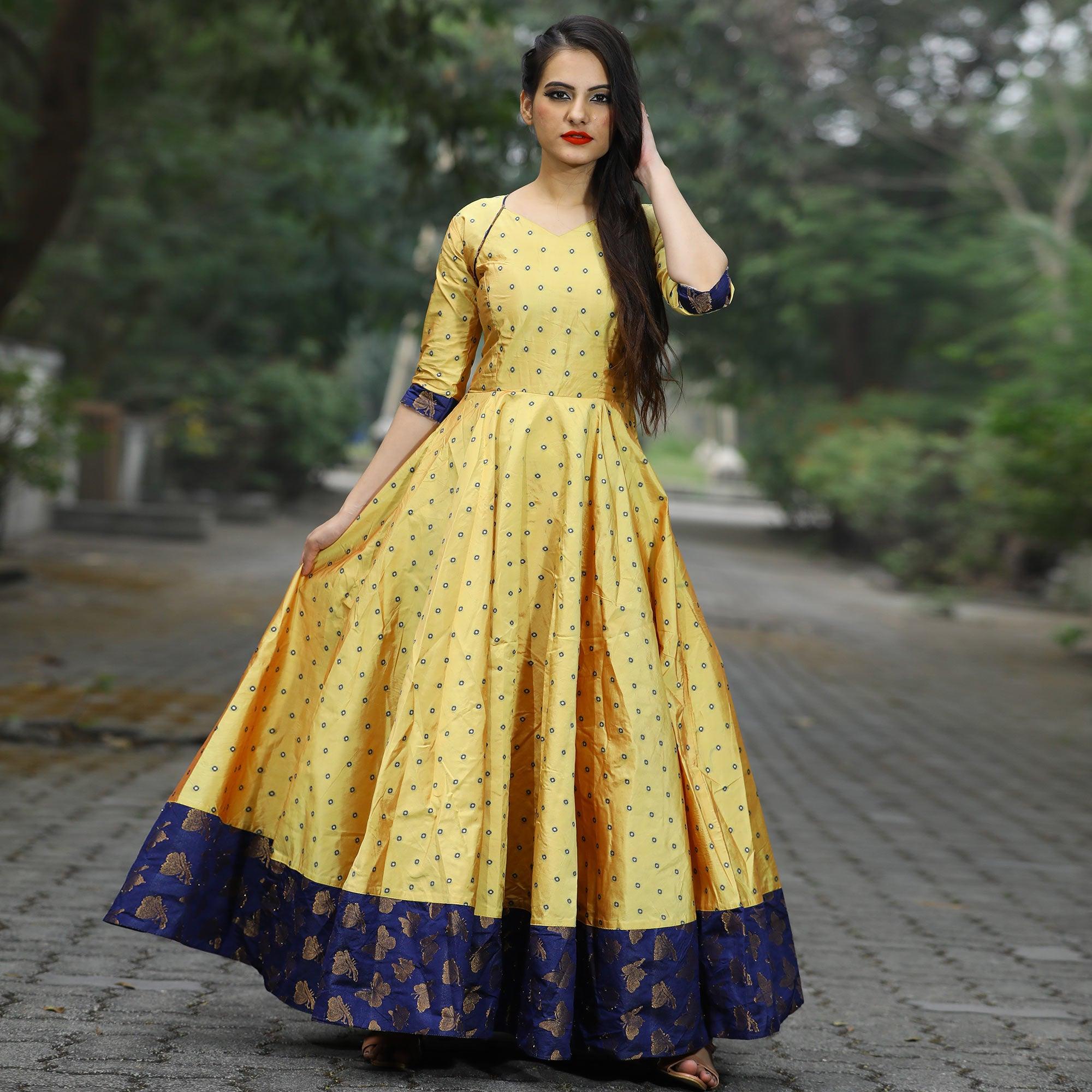 Glowing Light Yellow Colored Partywear Tapetta Gown - Peachmode