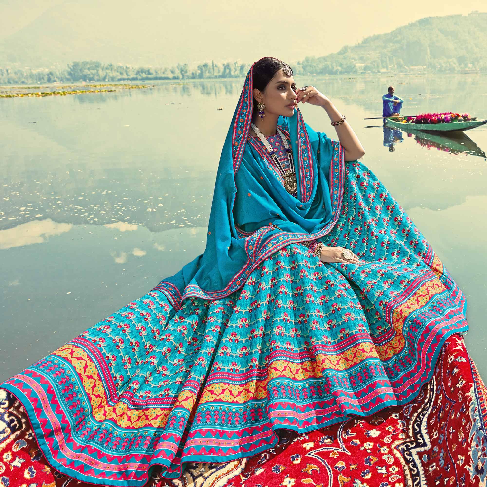 Glowing Sky Blue Coloured Wedding Wear Designer Stone Work Heavy Silk Lehenga Choli - Peachmode