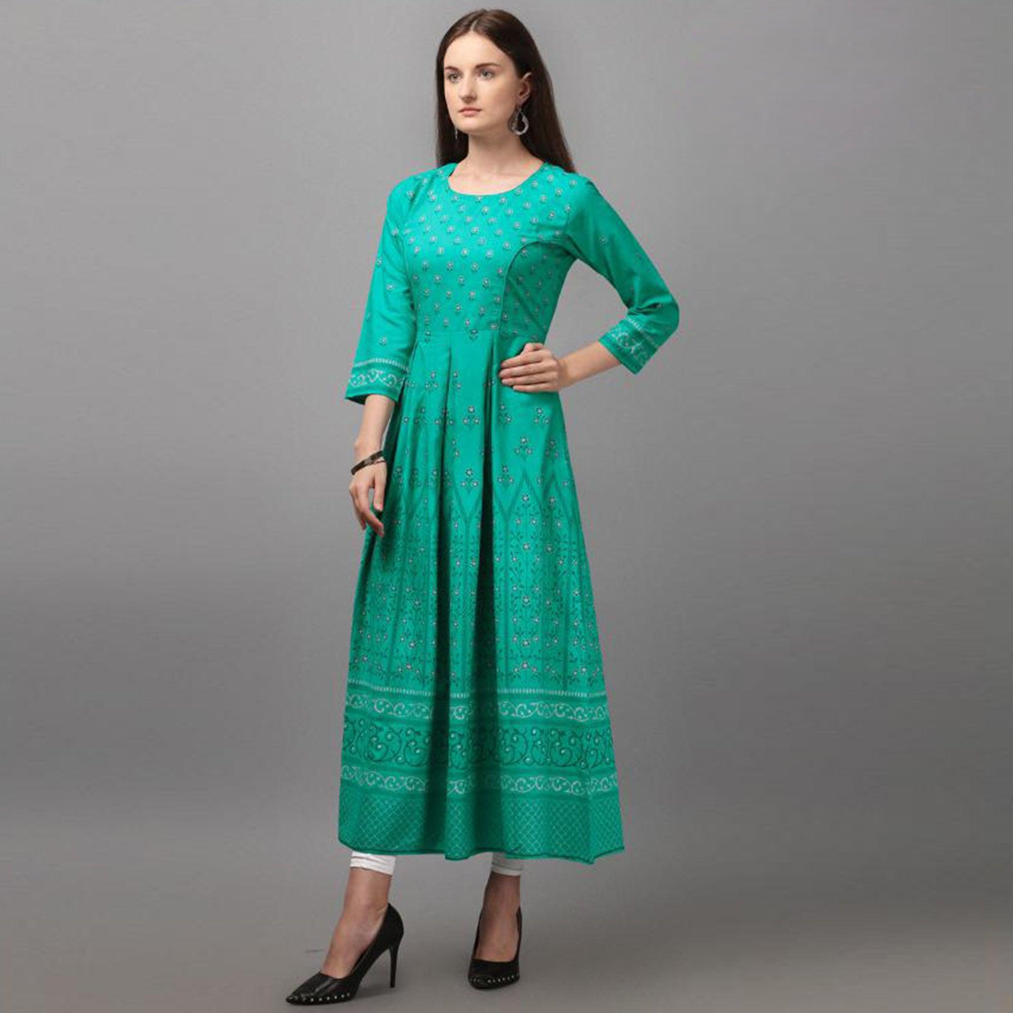 Glowing Turquoise Coloured Casual Wear Printed Rayon Malai Kurti - Peachmode