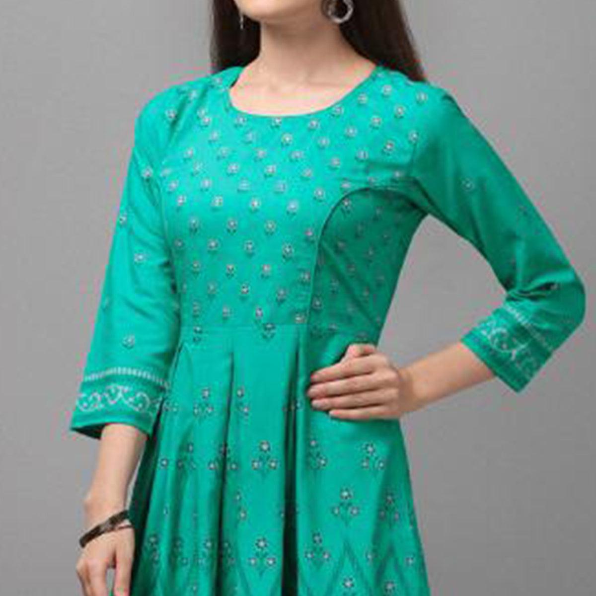 Glowing Turquoise Coloured Casual Wear Printed Rayon Malai Kurti - Peachmode