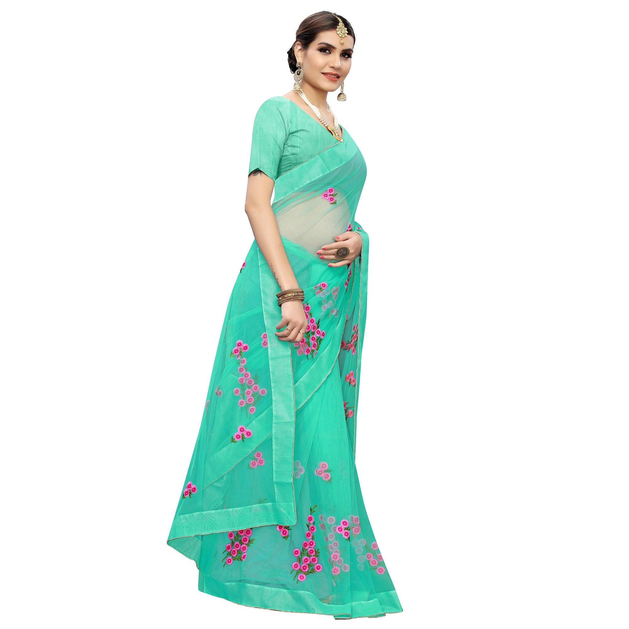 Glowing Turquoise Green Colored Embroidered Net Saree - Peachmode