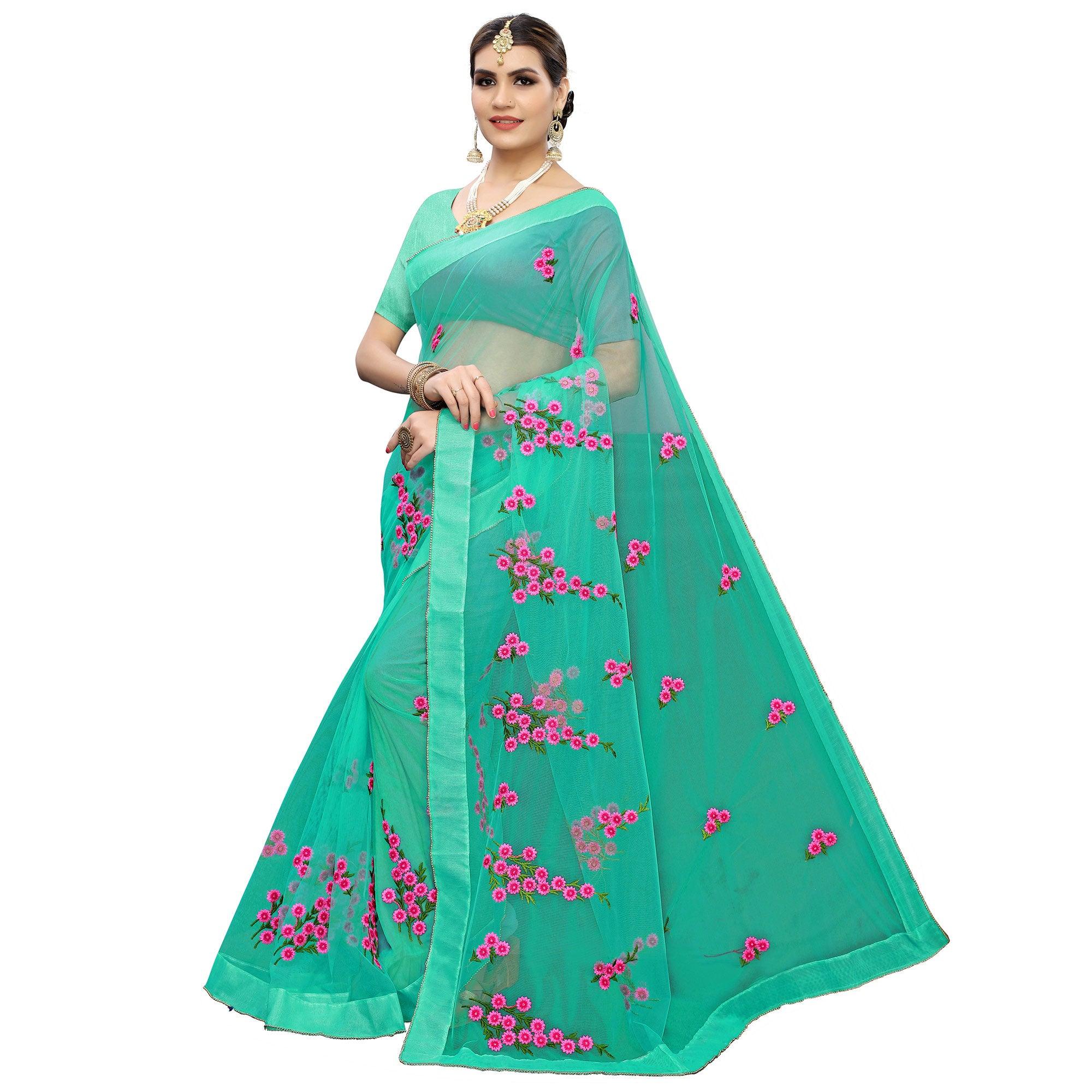 Glowing Turquoise Green Colored Embroidered Net Saree - Peachmode