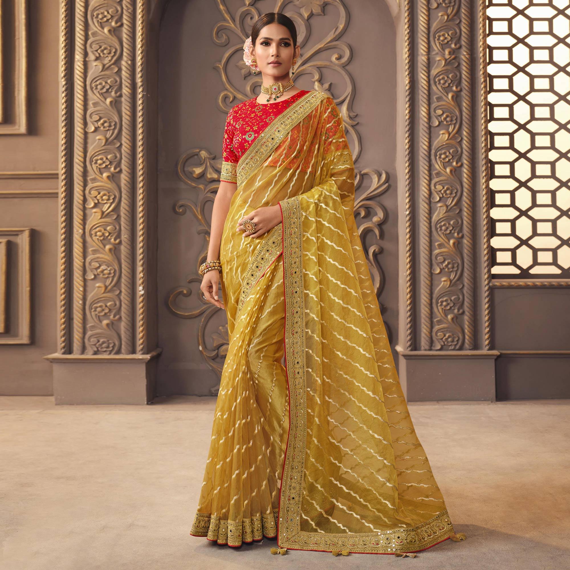 Golden Woven With Fancy Embroidered Border Organza Saree - Peachmode