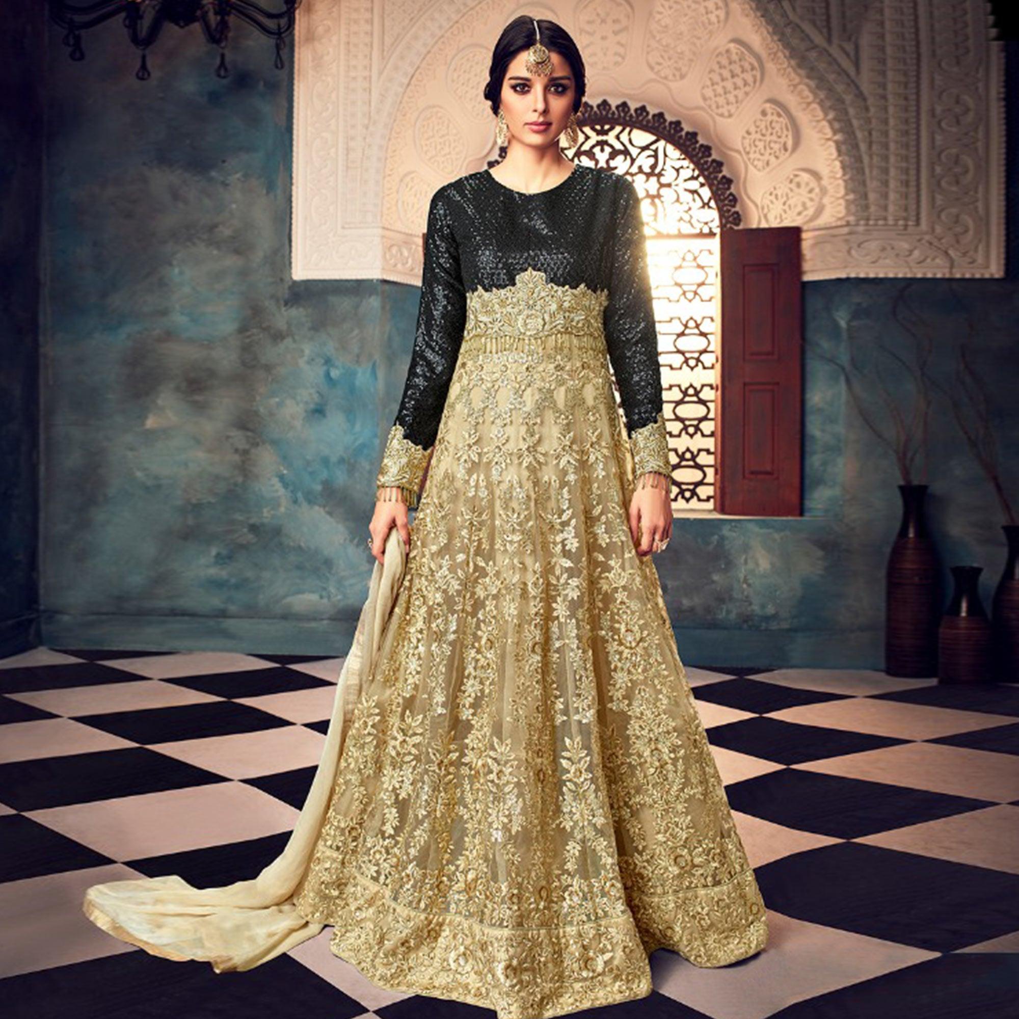 Gorgeous Golden-Black Colored Partywear Embroidered Netted Anarkali Suit