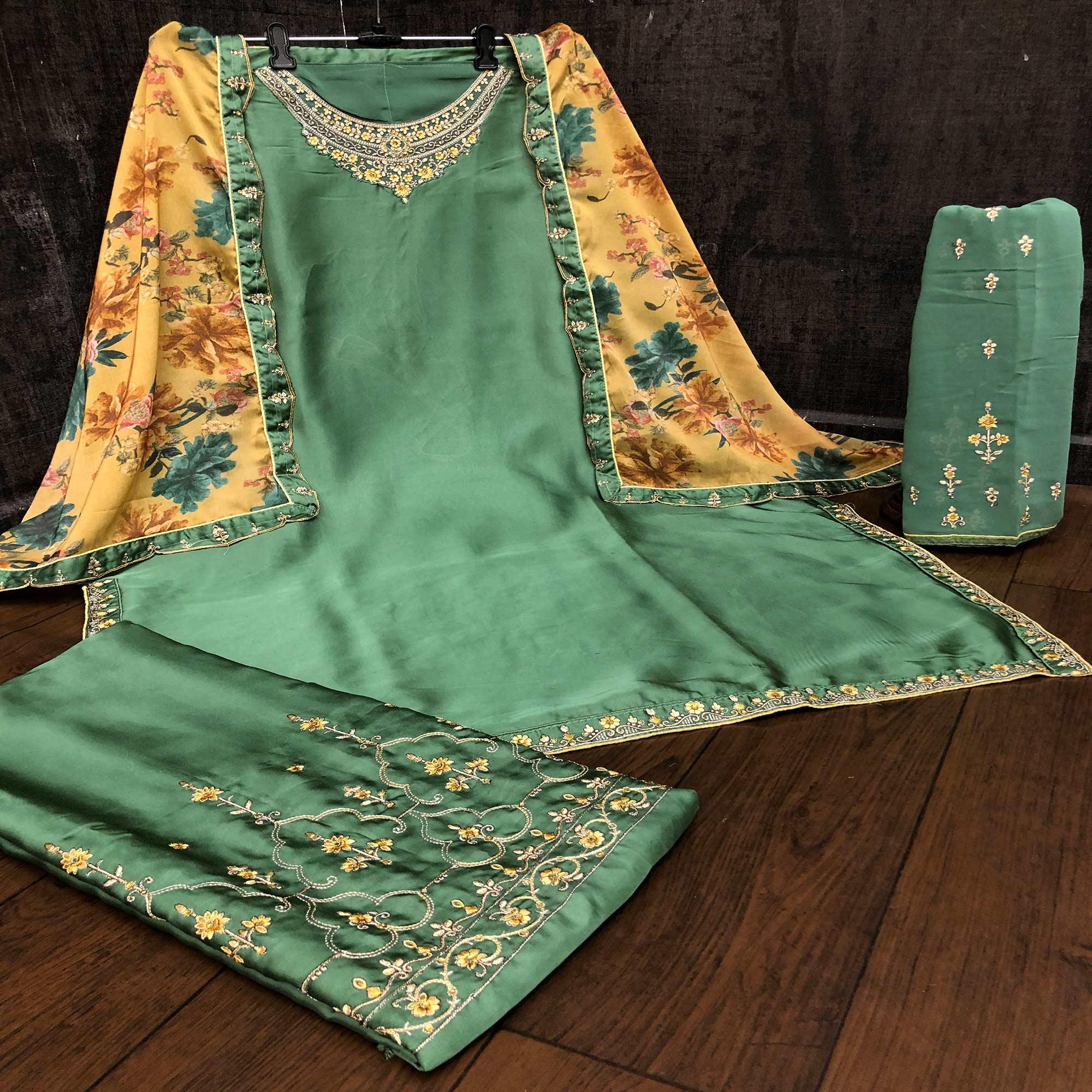 Gorgeous Green Colored Partywear Embroidered Muslin Satin Gharara Suit With Palazzo - Peachmode