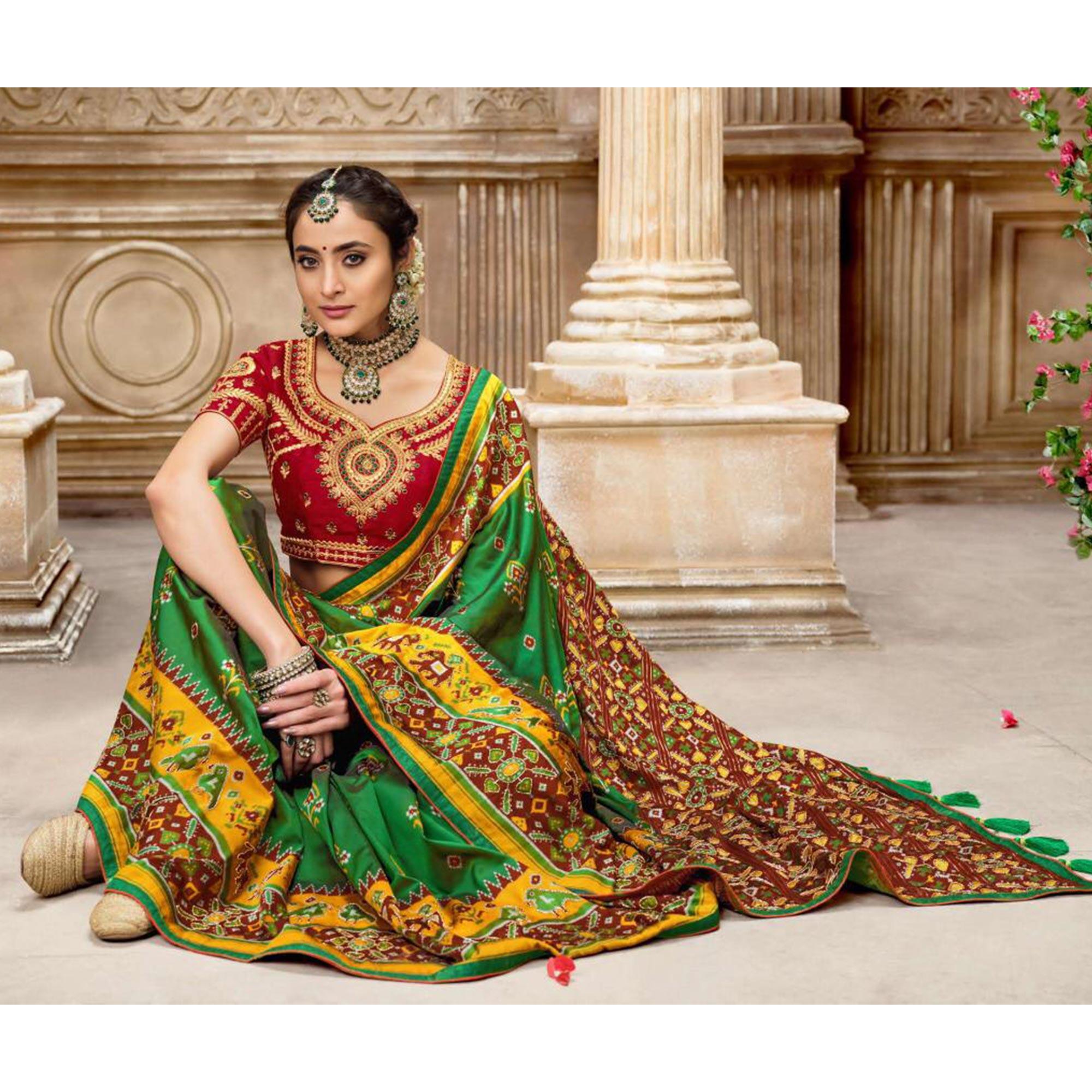 Gorgeous Green Colored Resham With Mirror Khatli Work Festive Wear Patan Patola Silk Saree - Peachmode
